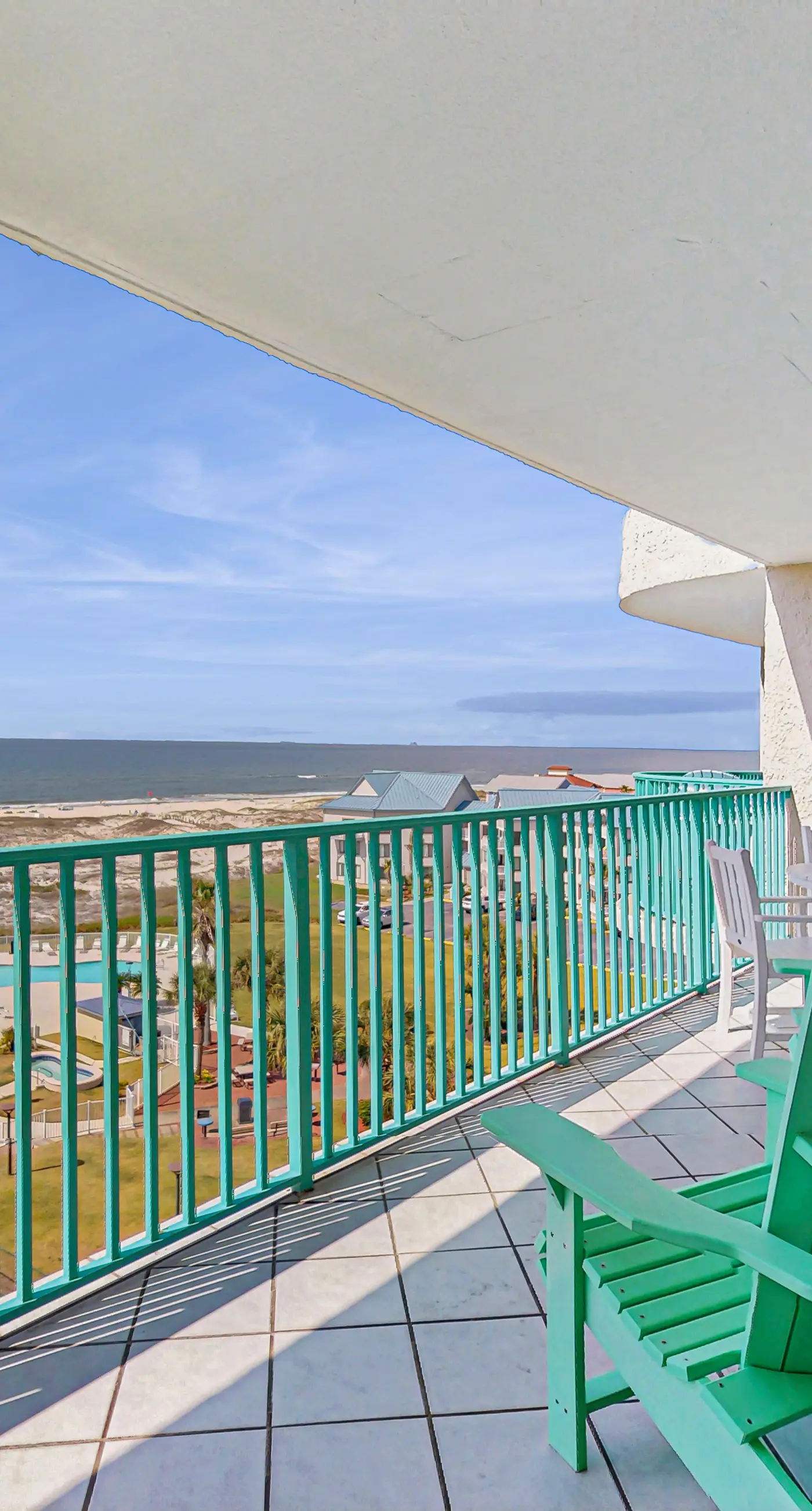 Beachfront condo with balcony, Gulf views, pools, gym, & game room at Plantation Palms