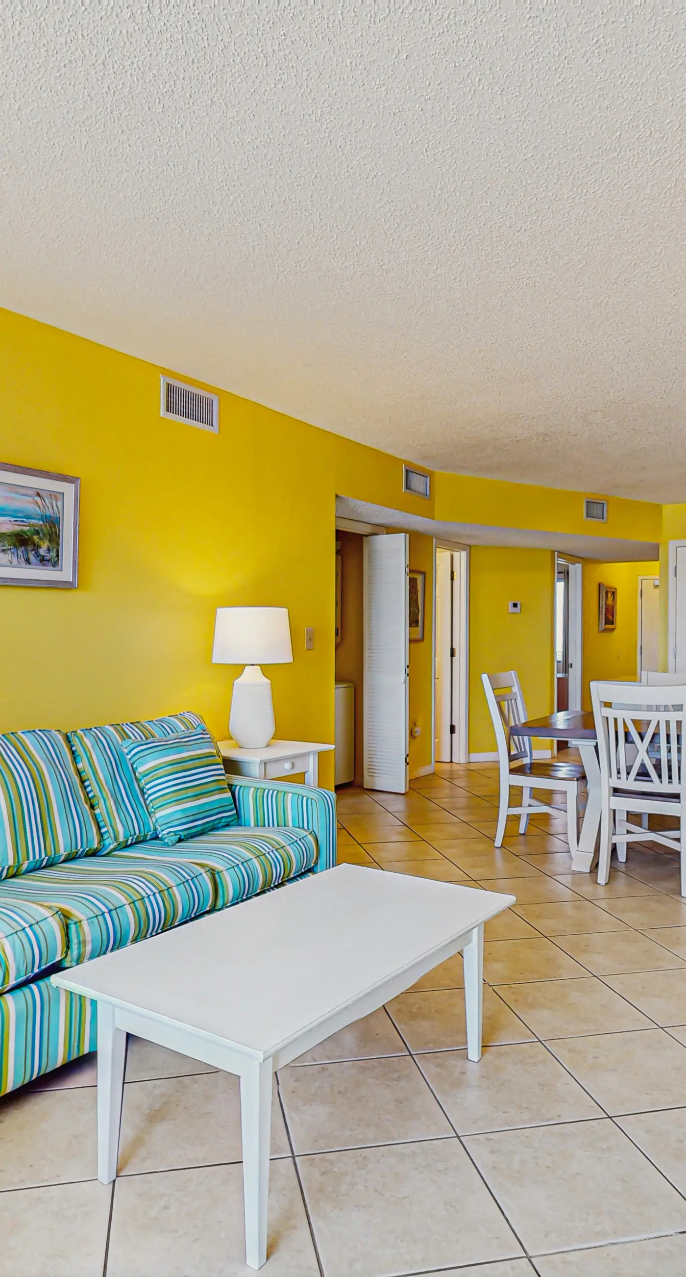 Beachfront condo with balcony, Gulf views, pools, gym, & game room at Plantation Palms