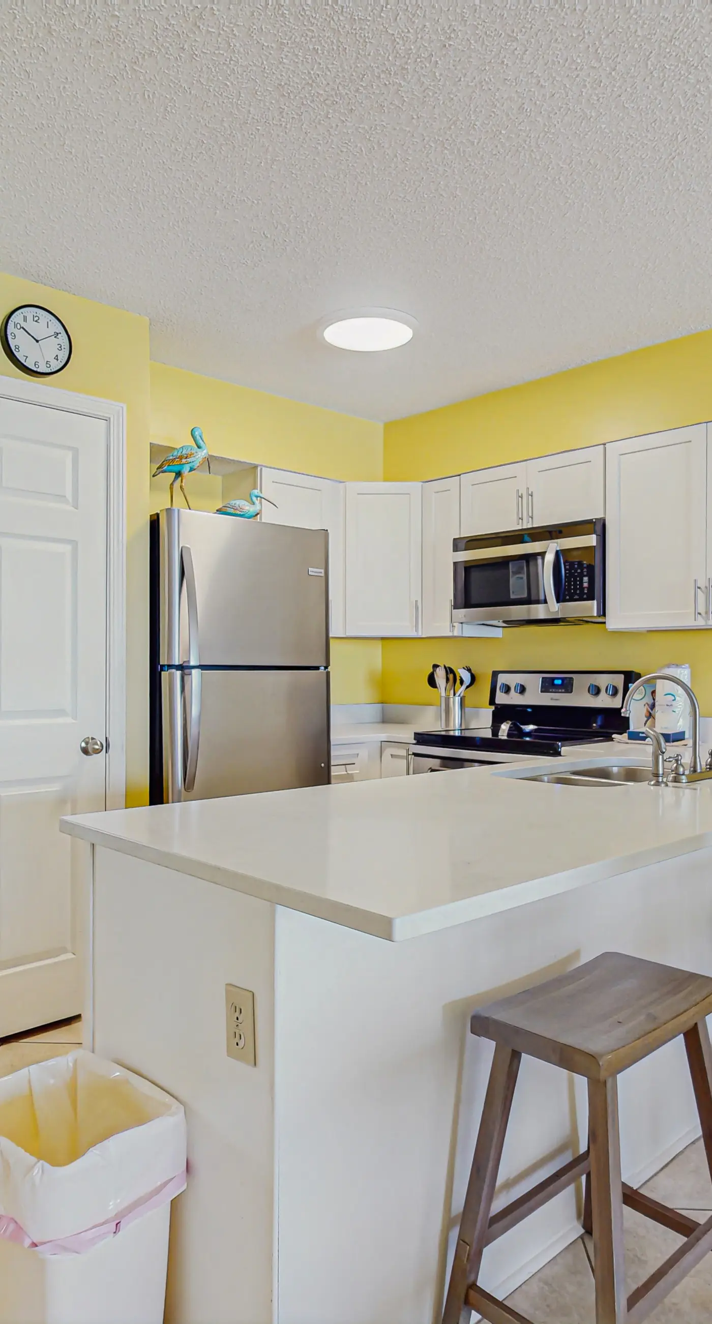 Beachfront condo with balcony, Gulf views, pools, gym, & game room at Plantation Palms