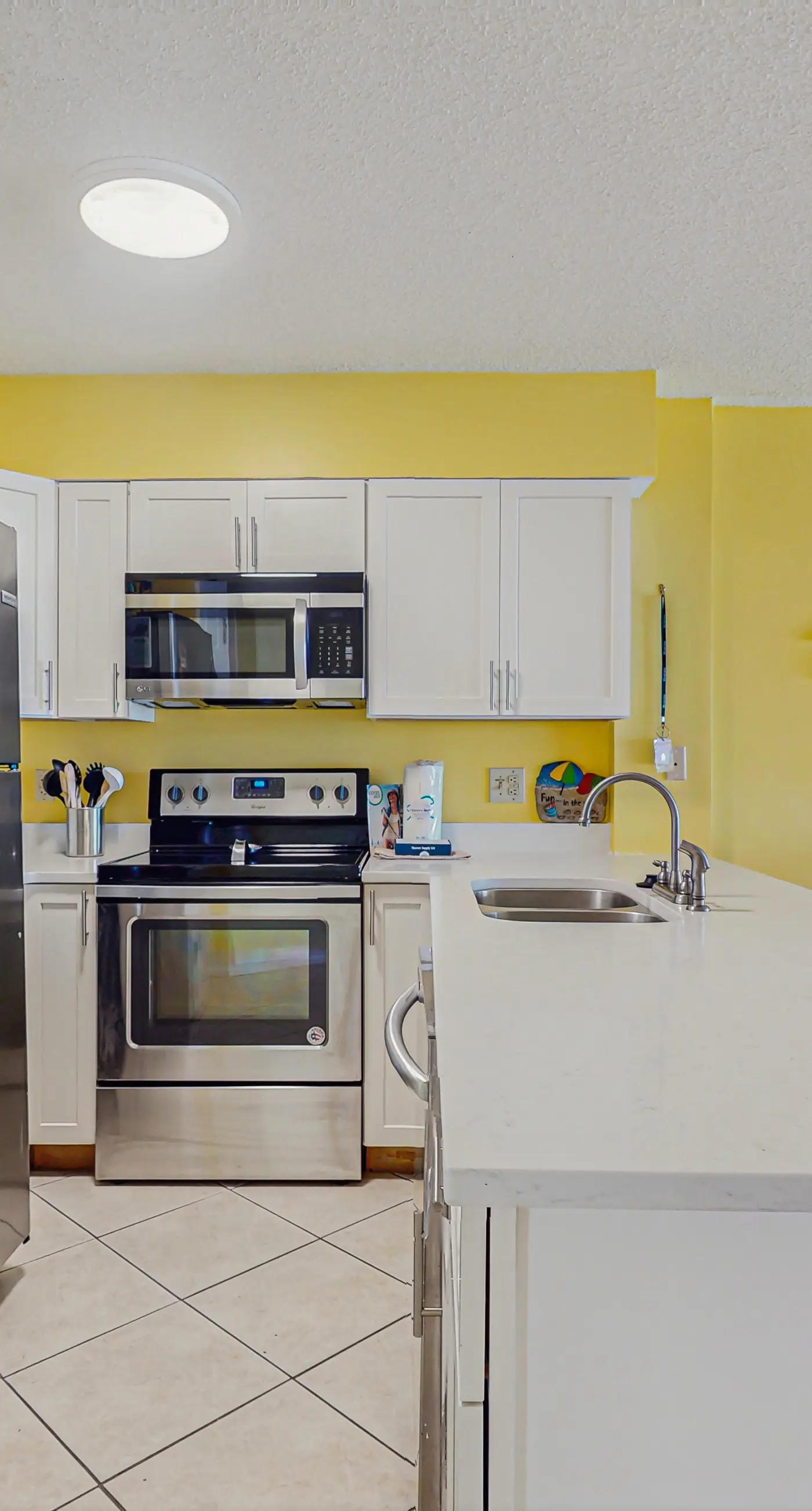 Beachfront condo with balcony, Gulf views, pools, gym, & game room at Plantation Palms