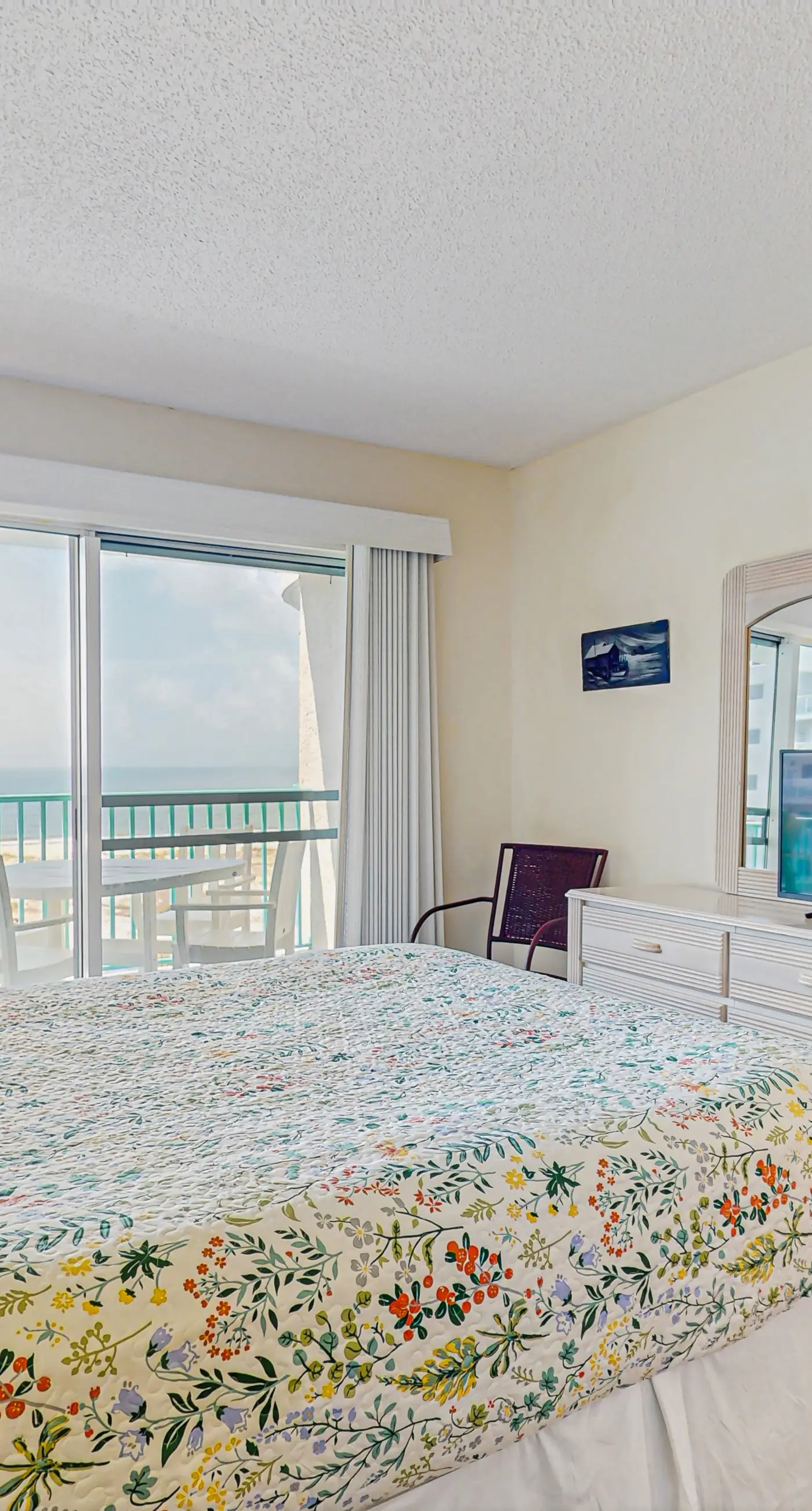 Beachfront condo with balcony, Gulf views, pools, gym, & game room at Plantation Palms