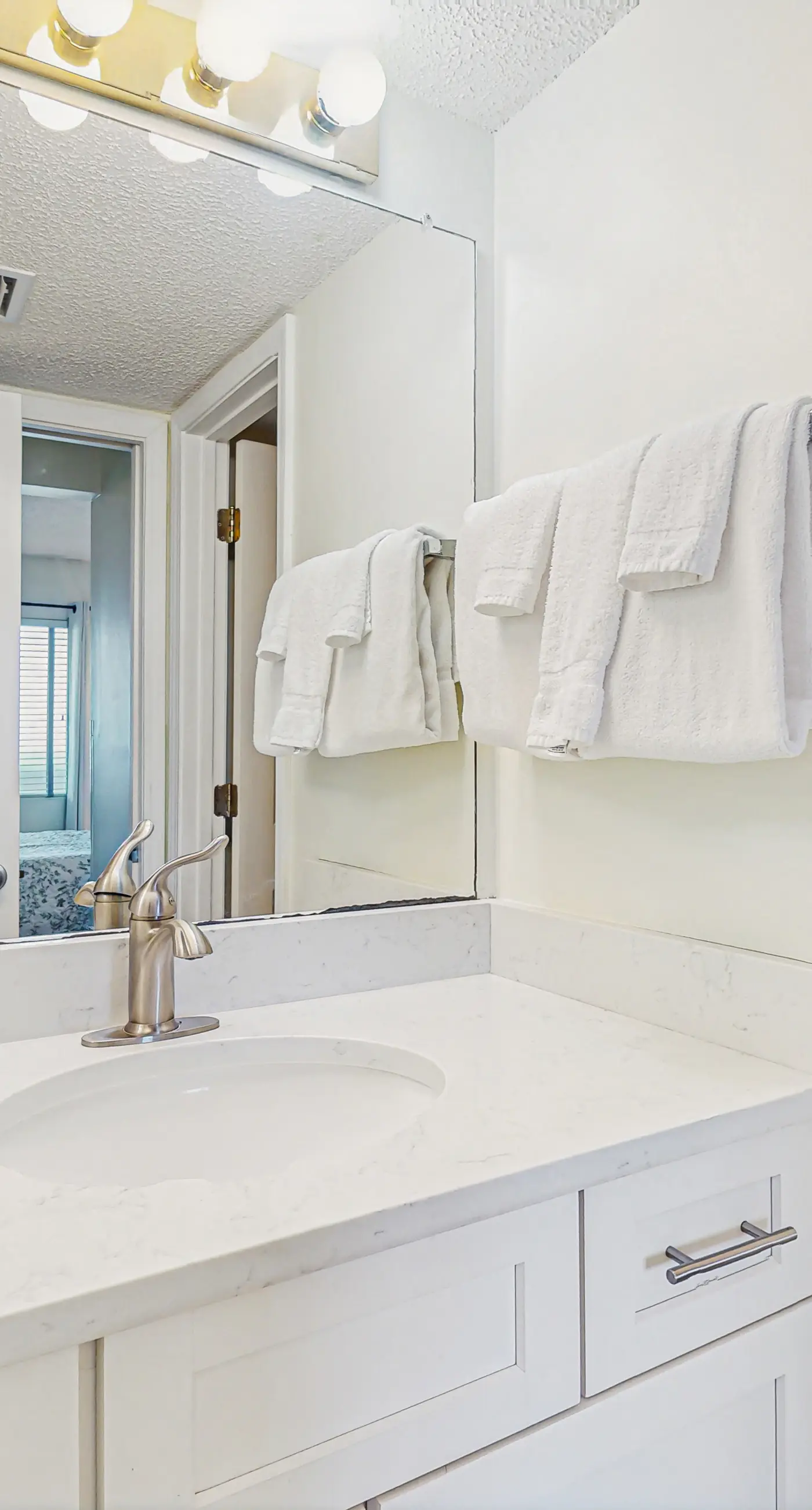 Beachfront condo with balcony, Gulf views, pools, gym, & game room at Plantation Palms