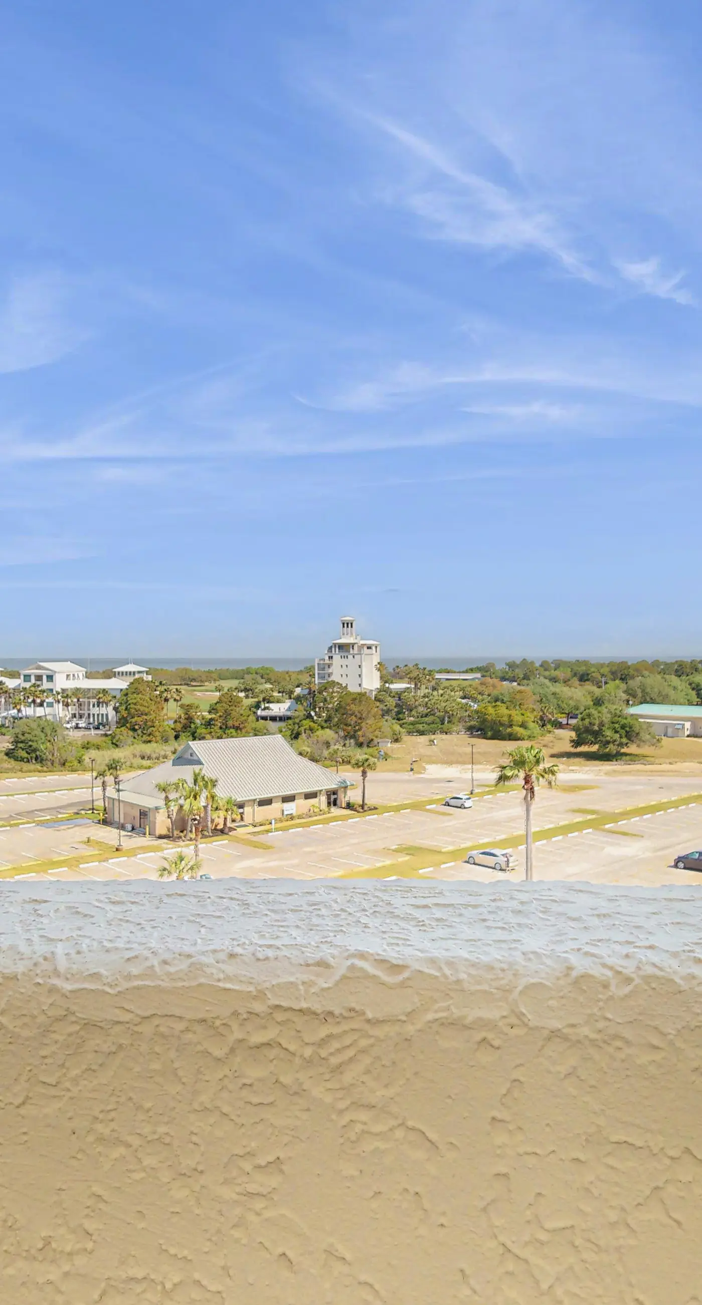 Beachfront condo with balcony, Gulf views, pools, gym, & game room at Plantation Palms