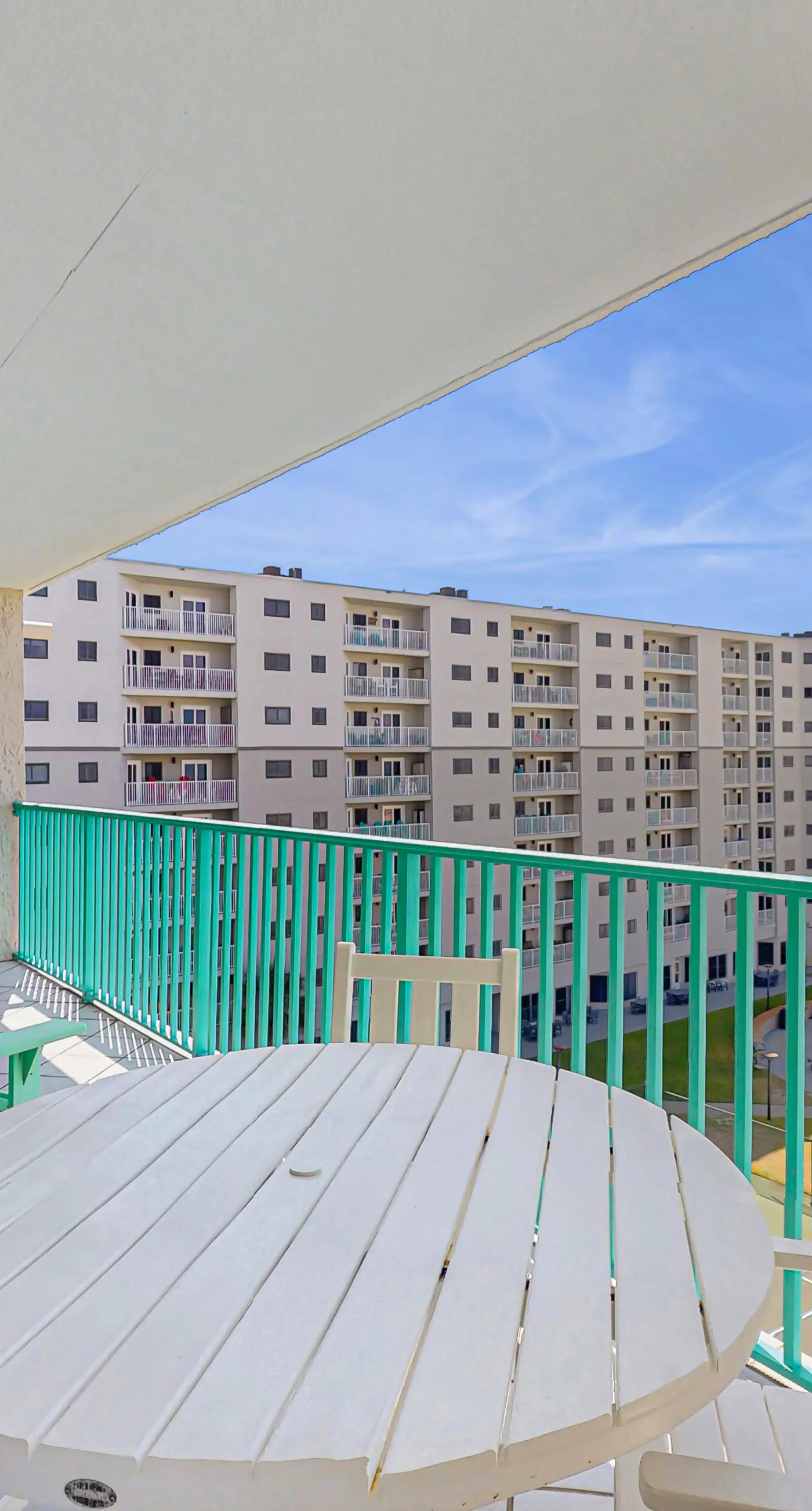 Beachfront condo with balcony, Gulf views, pools, gym, & game room at Plantation Palms