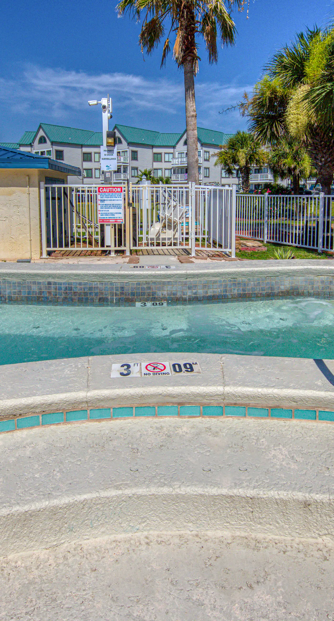 Beachfront condo with balcony, Gulf views, pools, gym, & game room at Plantation Palms