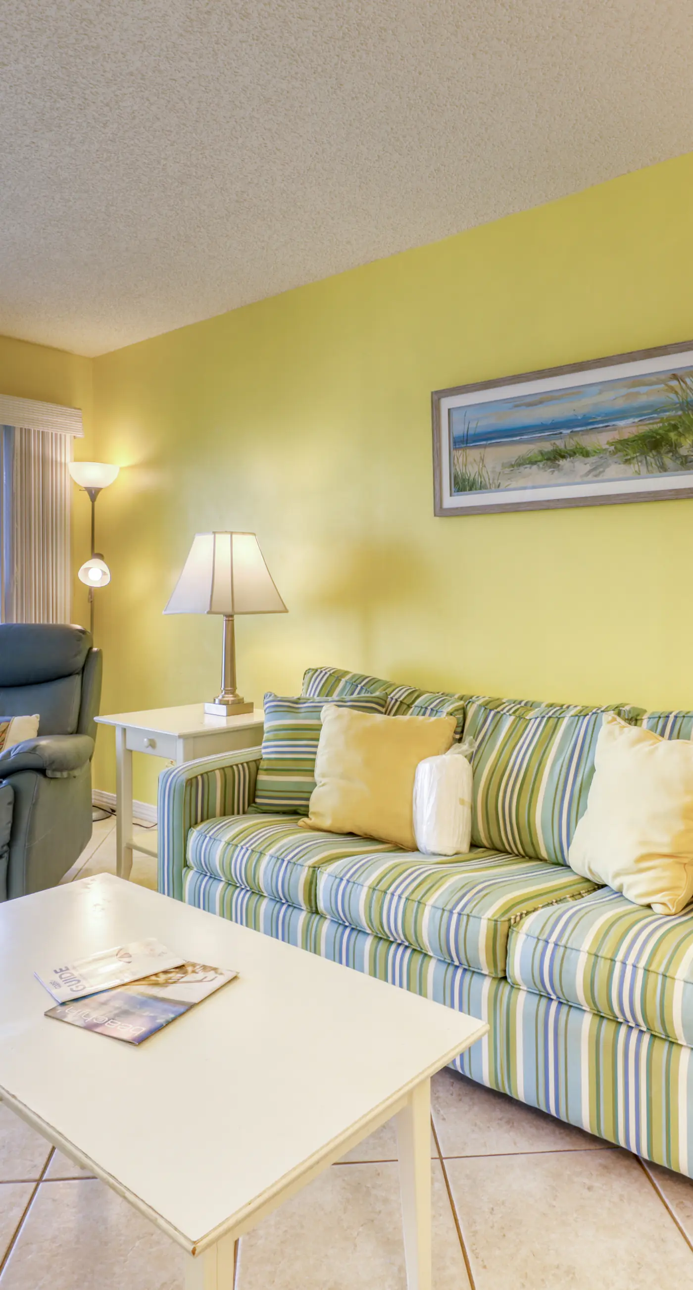 Beachfront condo with balcony, Gulf views, pools, gym, & game room at Plantation Palms