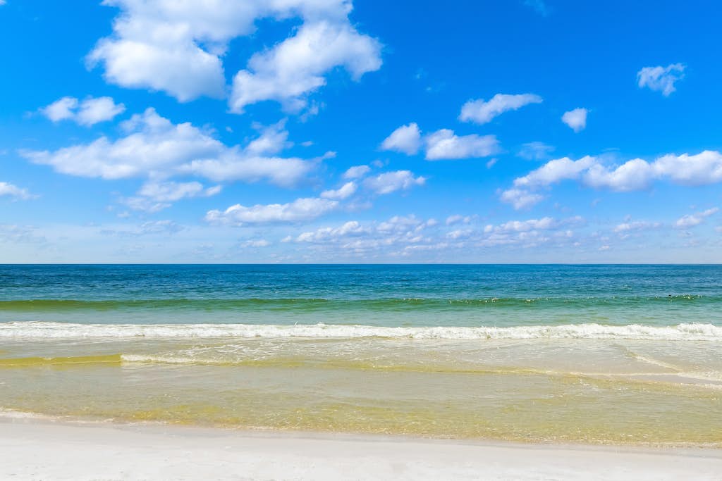 Condo near the beach with shared, heated pool and tennis