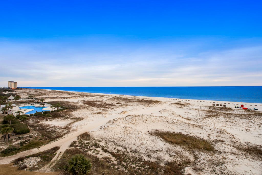 Gulf-Front Condo with Private Balcony, Gas Grill, Shared Outdoor Pool, & Free WiFi