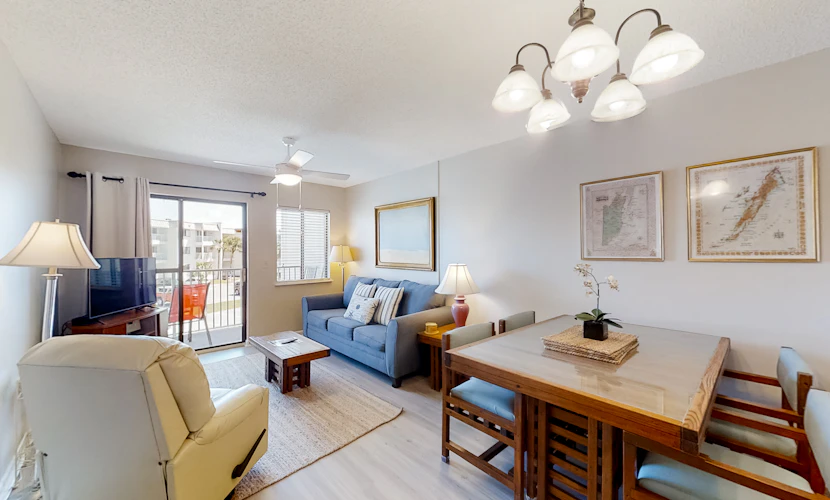 Condo Steps from the Sand with Balcony, Resort Pools, Central AC, & WiFi