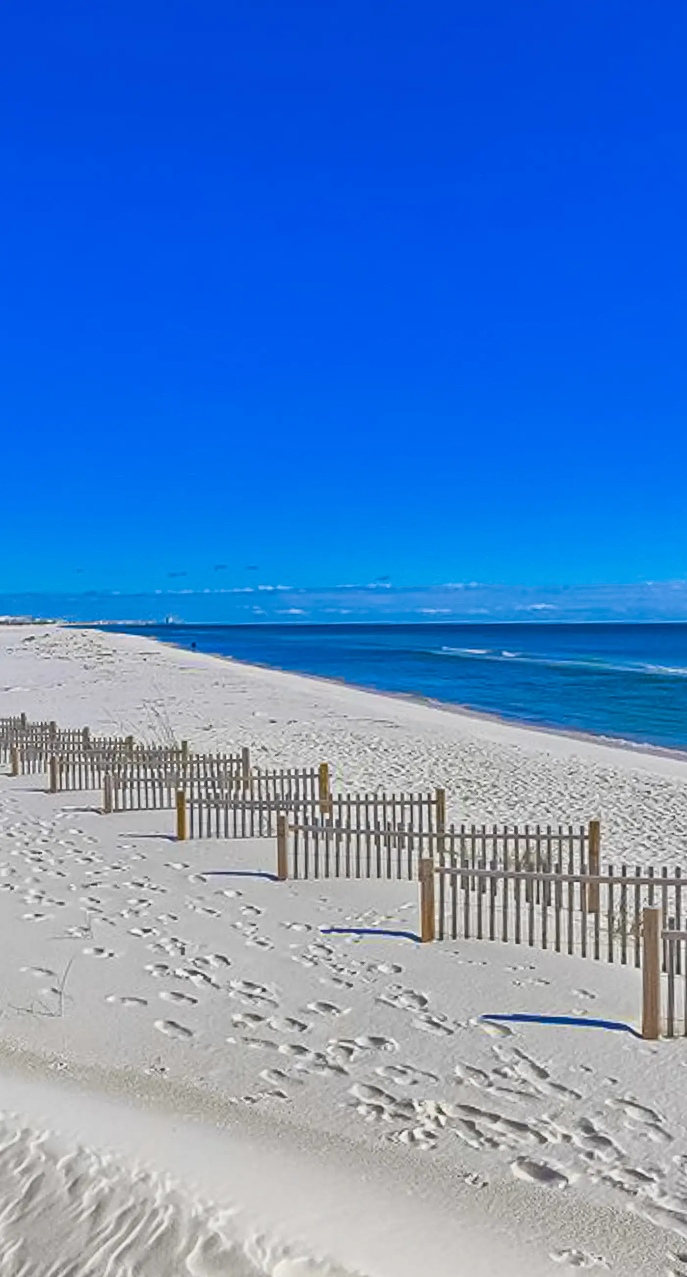 Dog-friendly townhome with Gulf views, balconies, pool, W/D, & AC - snowbirds OK