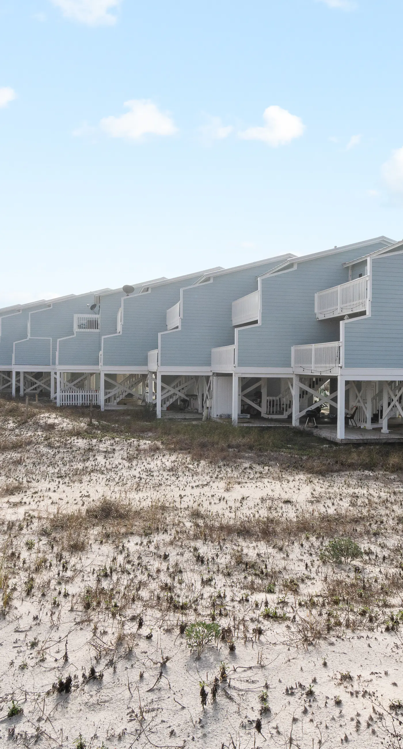 Dog-friendly townhome with Gulf views, balconies, pool, W/D, & AC - snowbirds OK