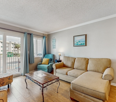 Spacious condo with balcony and shared pools and tennis, on-site golfing