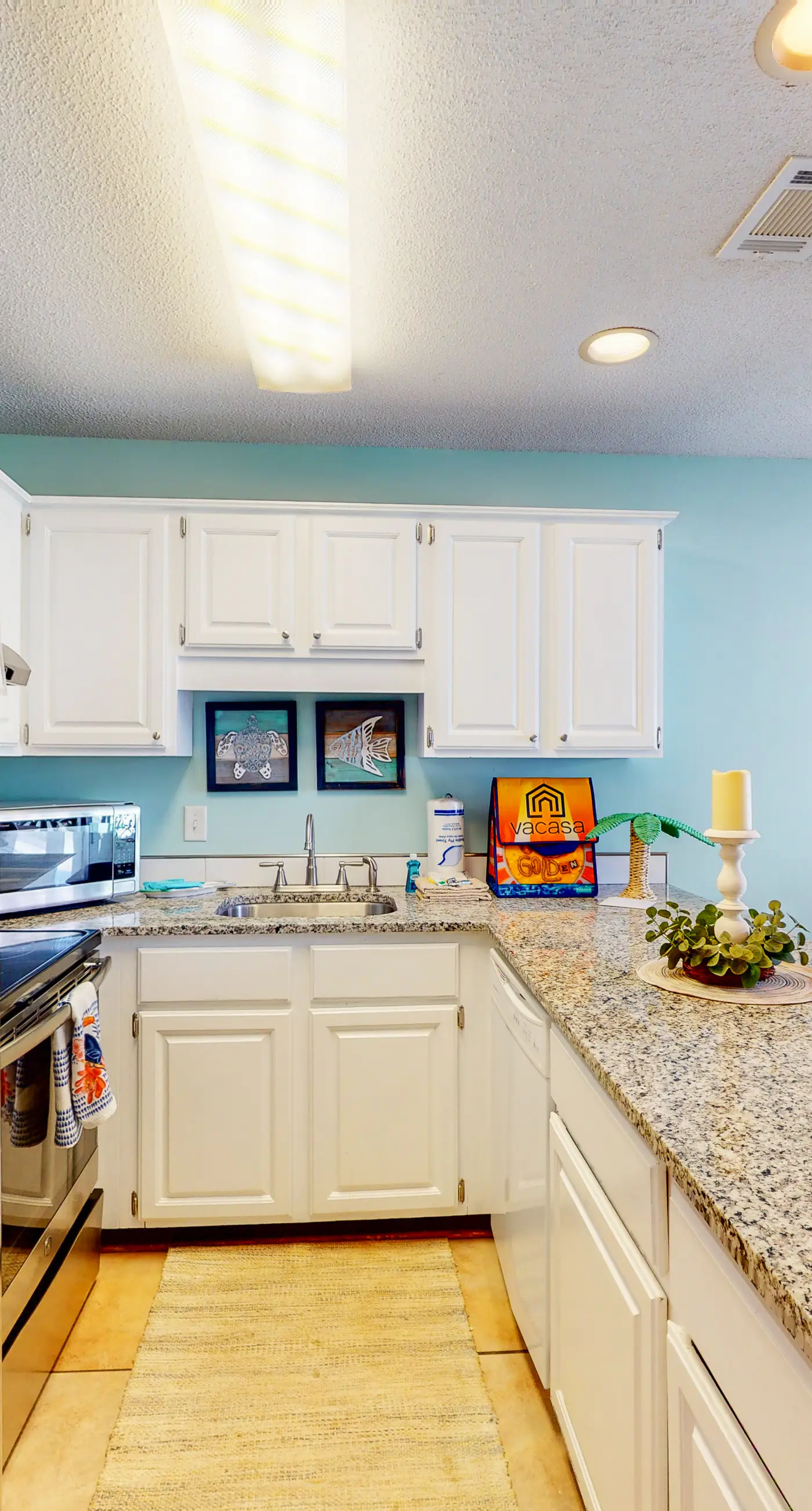 Stunning water-view condo with pool - steps away from the beach