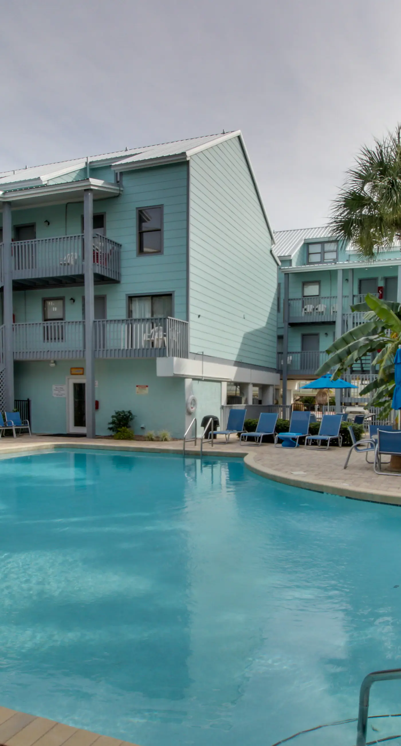 Stunning water-view condo with pool - steps away from the beach