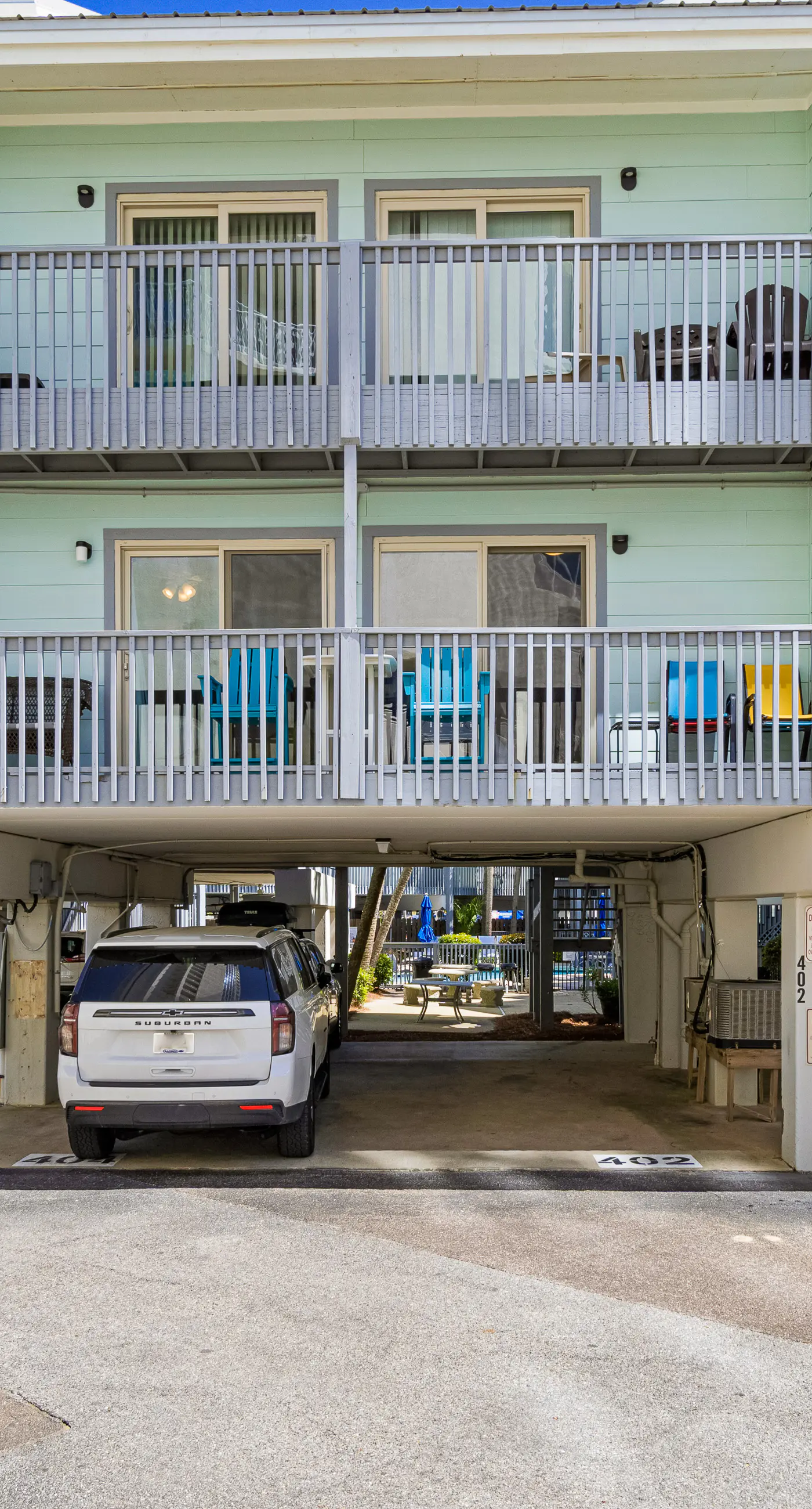 Stunning water-view condo with pool - steps away from the beach