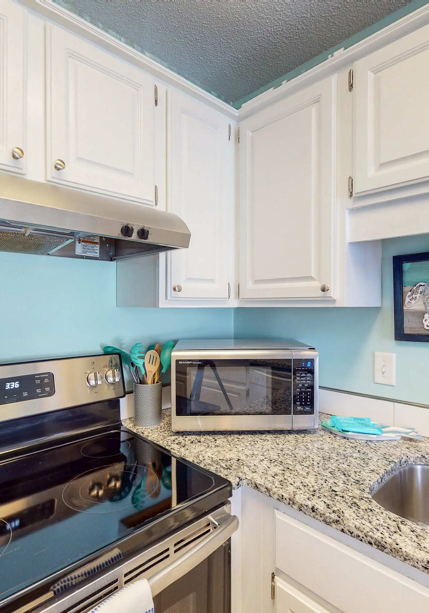Stunning water-view condo with pool - steps away from the beach