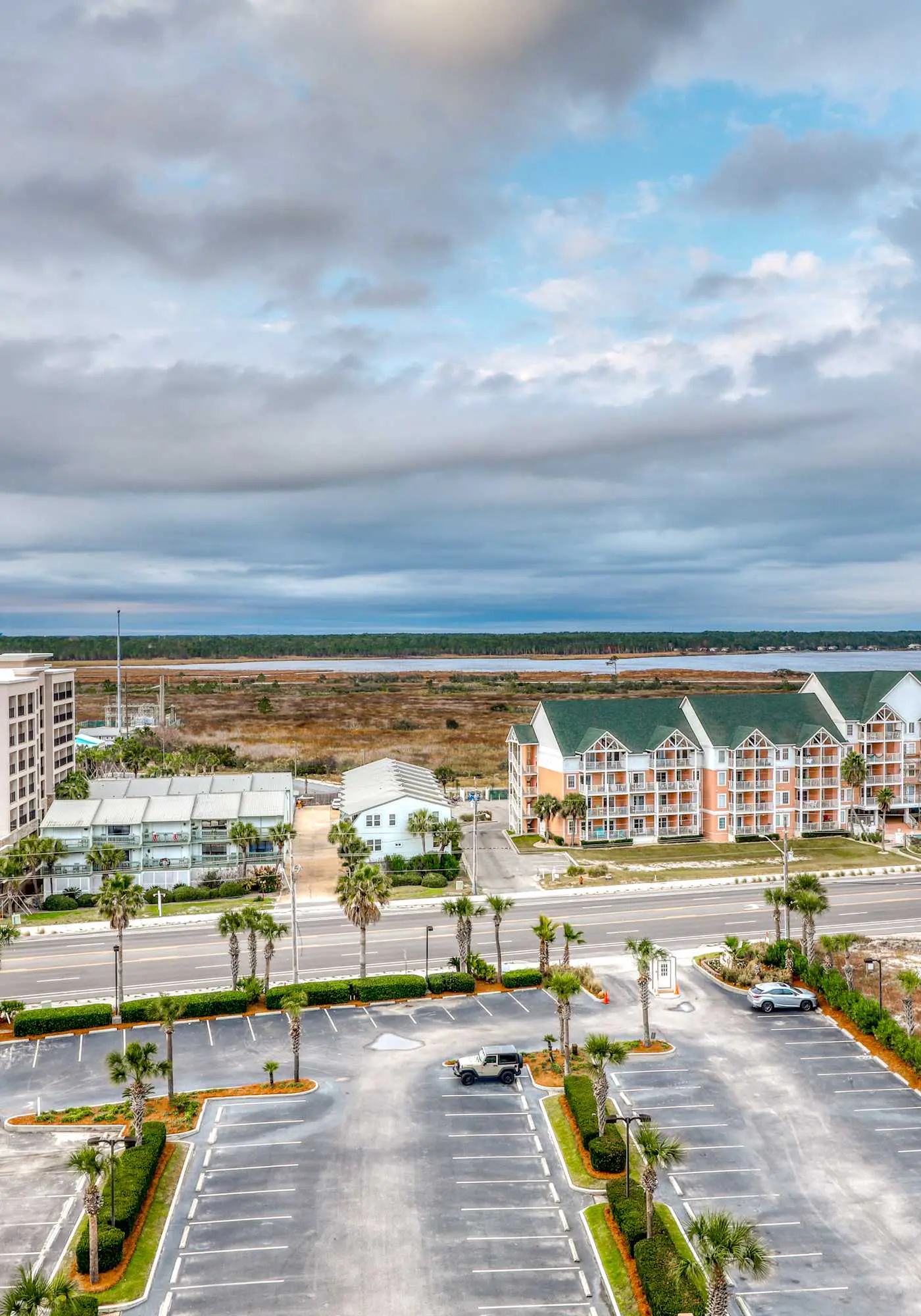 Gulf front condo with community outdoor and indoor pools, hot tub, and sauna