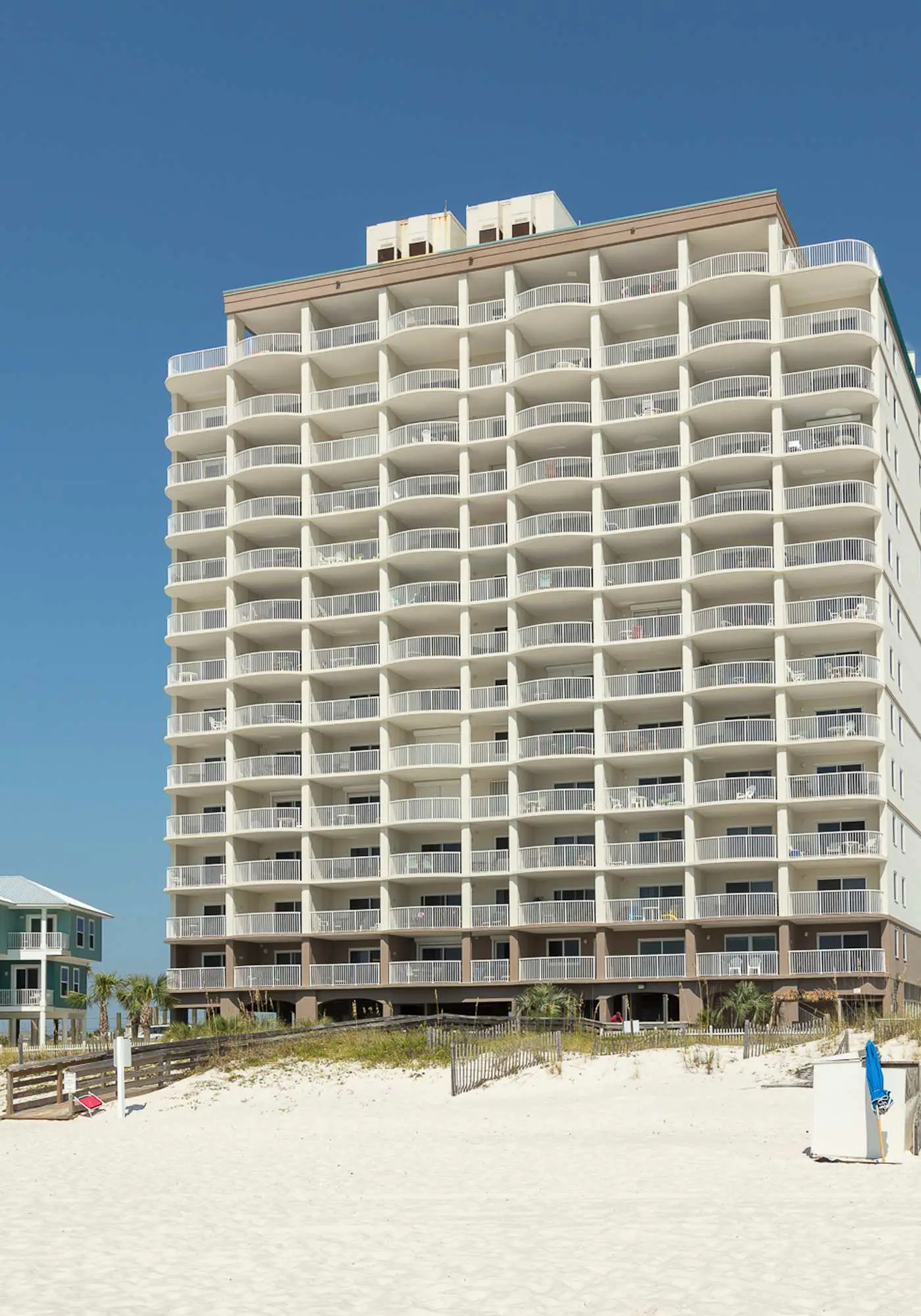Gulf front condo with community outdoor and indoor pools, hot tub, and sauna