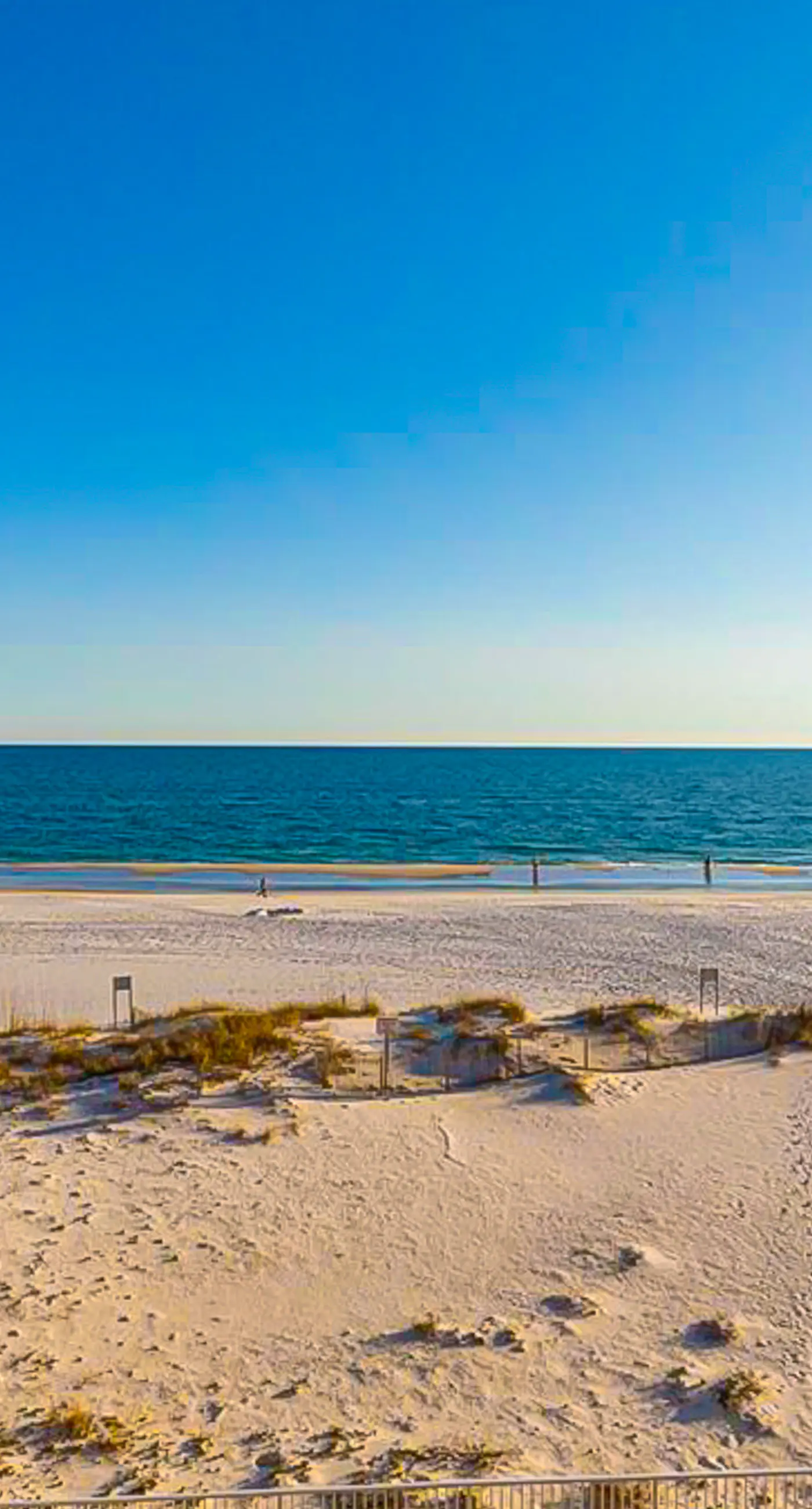 Gulf-front 5th-floor condo with balcony, pool & beach access - snowbird-friendly