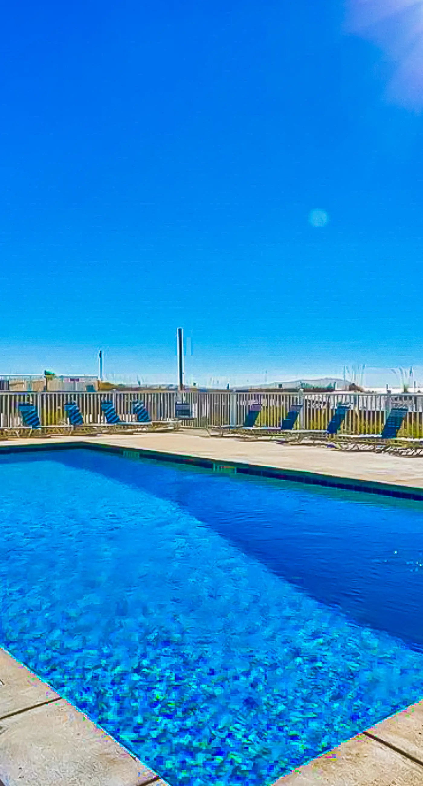 Top-floor beachfront condo with Gulf-view balcony, pool & beach access