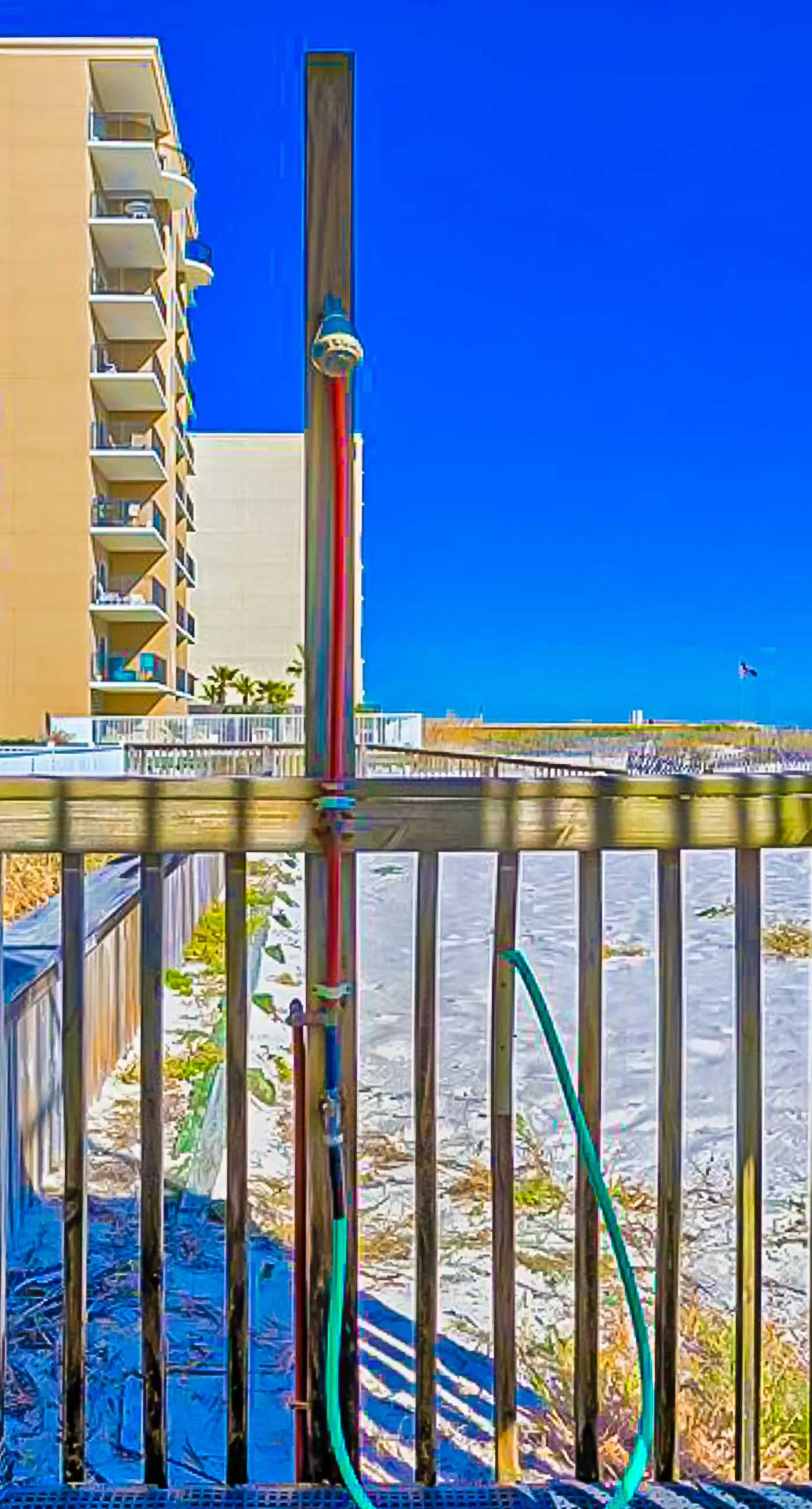 Top-floor beachfront condo with Gulf-view balcony, pool & beach access