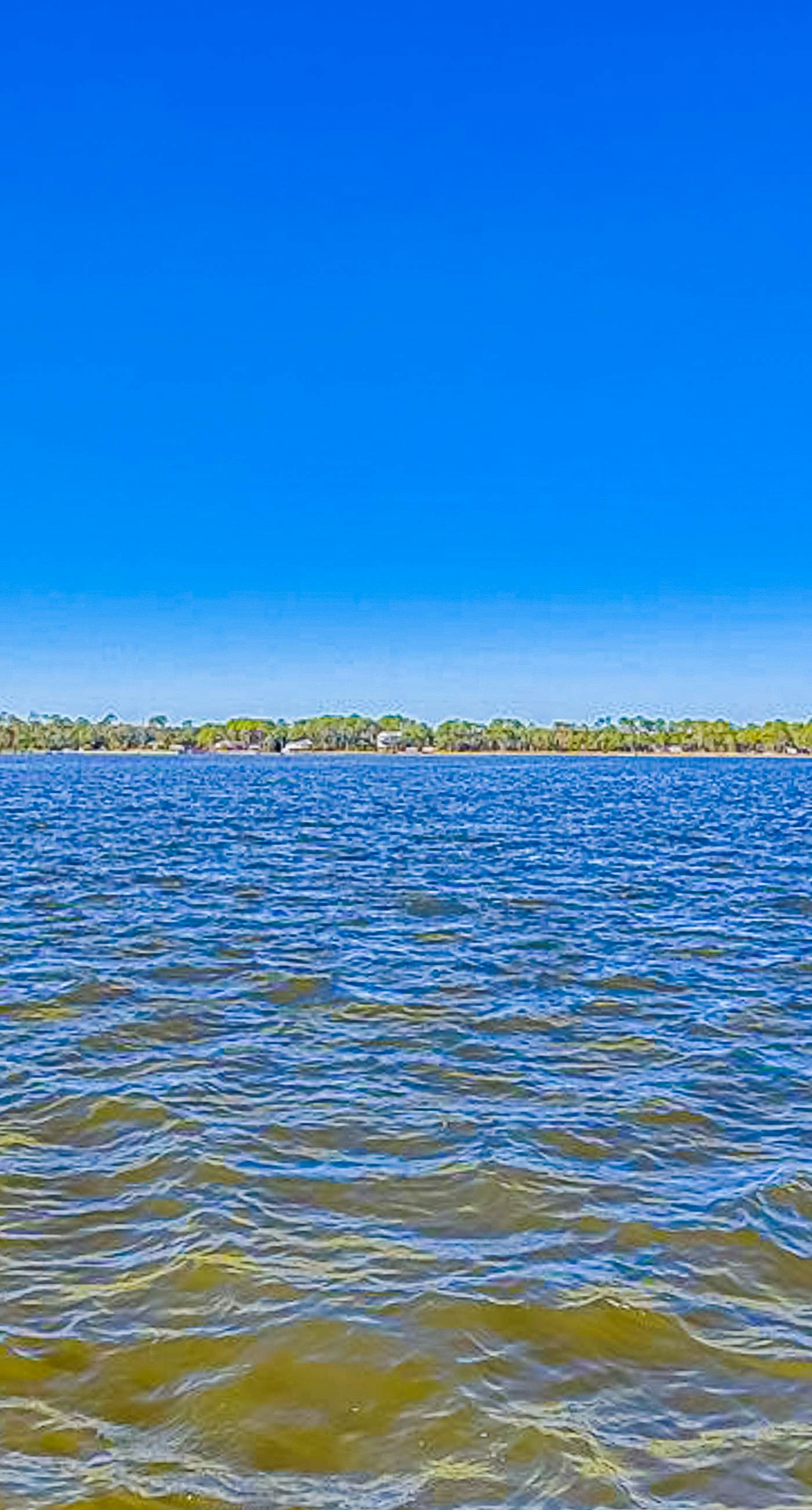 Top-floor beachfront condo with Gulf-view balcony, pool & beach access