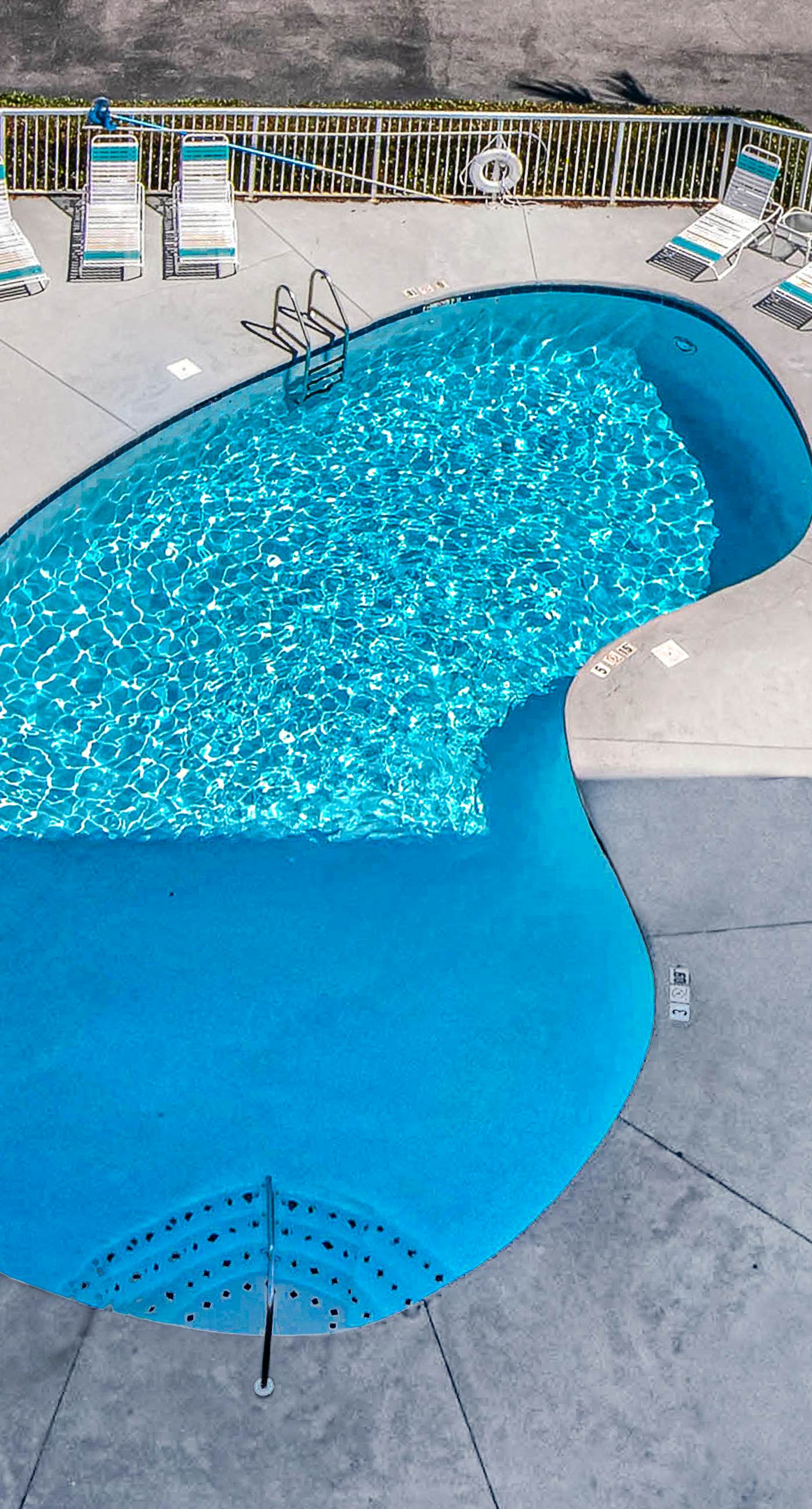 6th-floor condo with pool, central A/C, free WiFi, balcony, & views