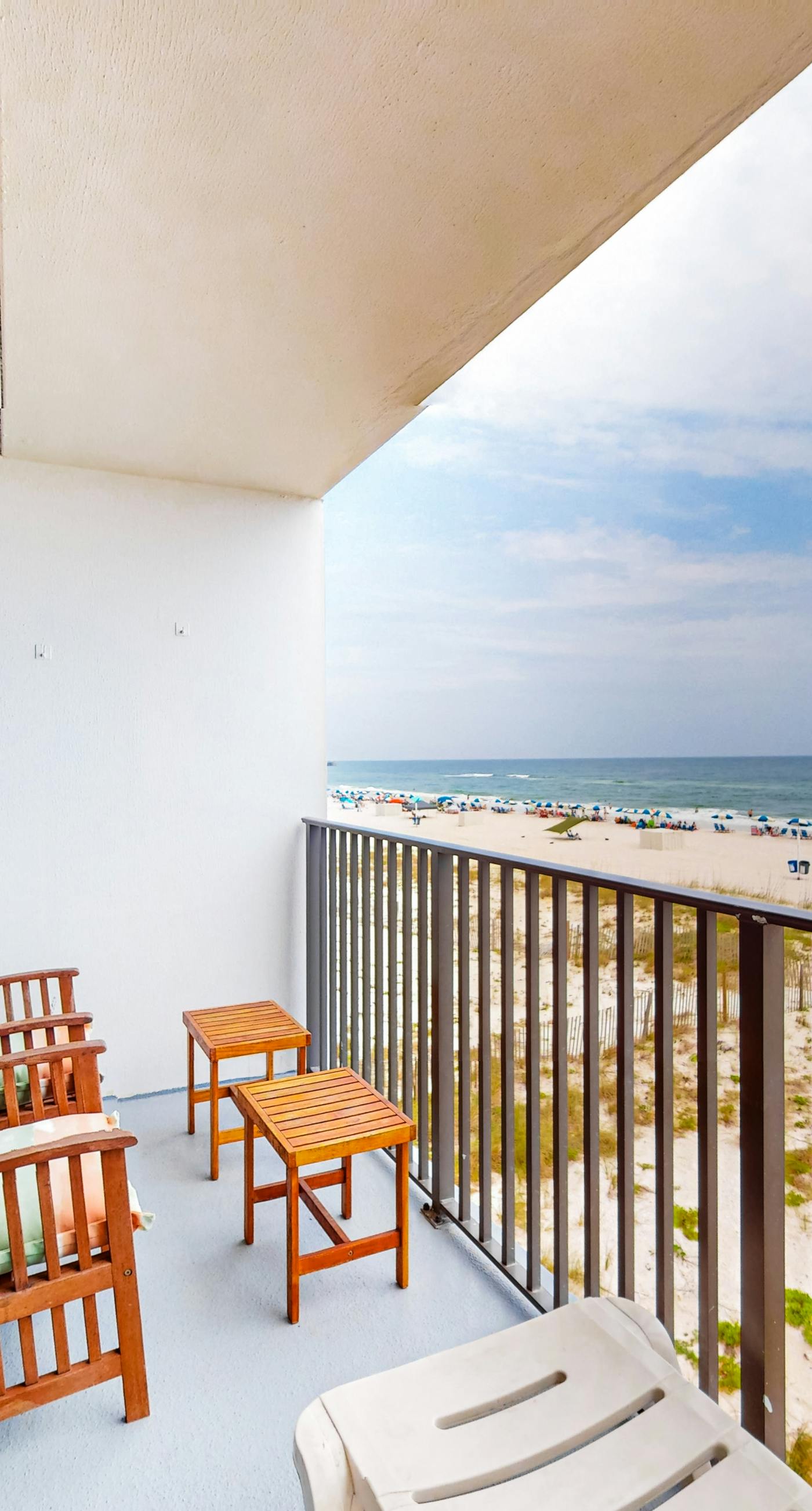 Gulf-front condo with balcony, pool, central AC, & grill