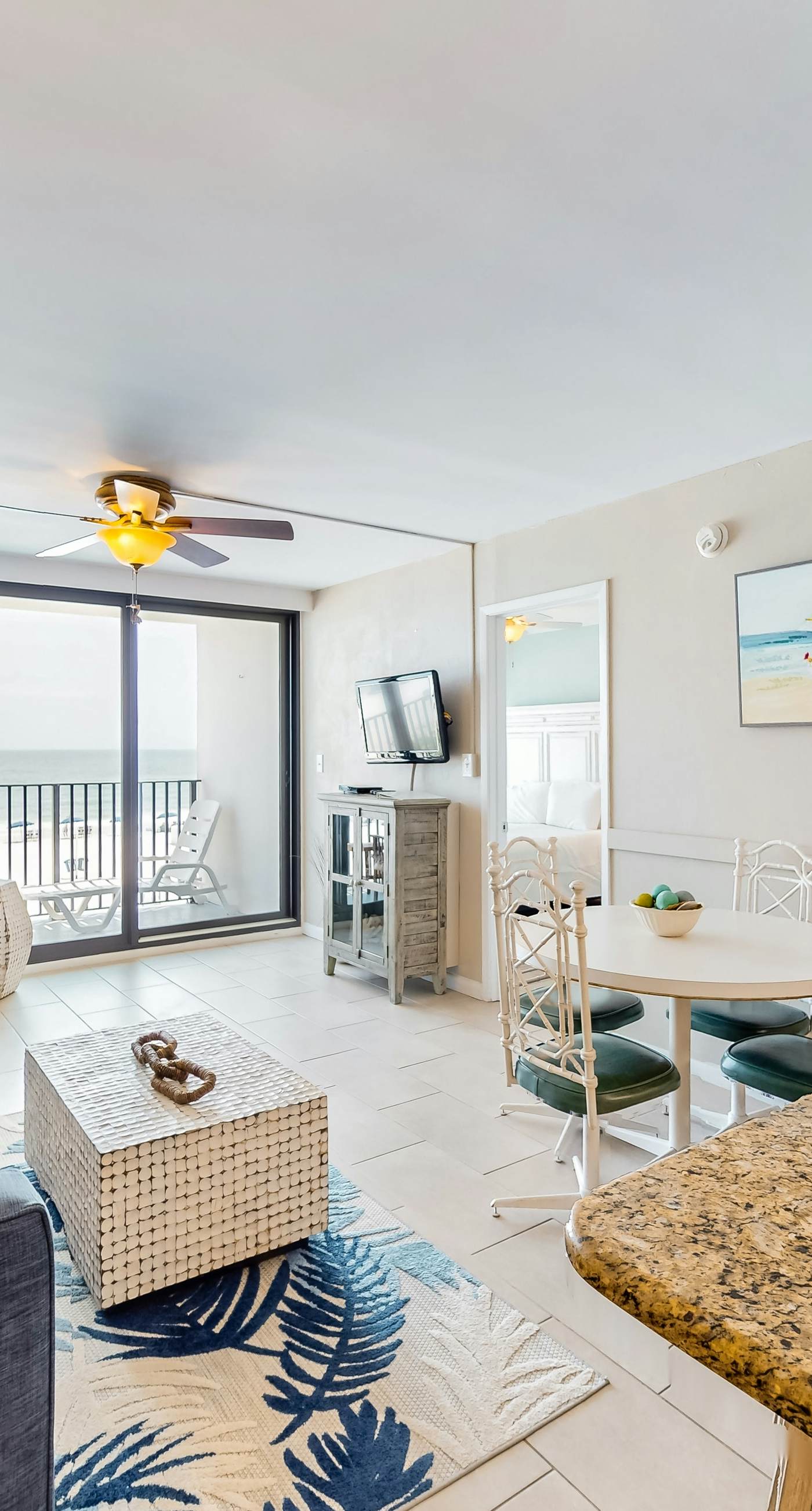 Gulf-front condo with balcony, pool, central AC, & grill