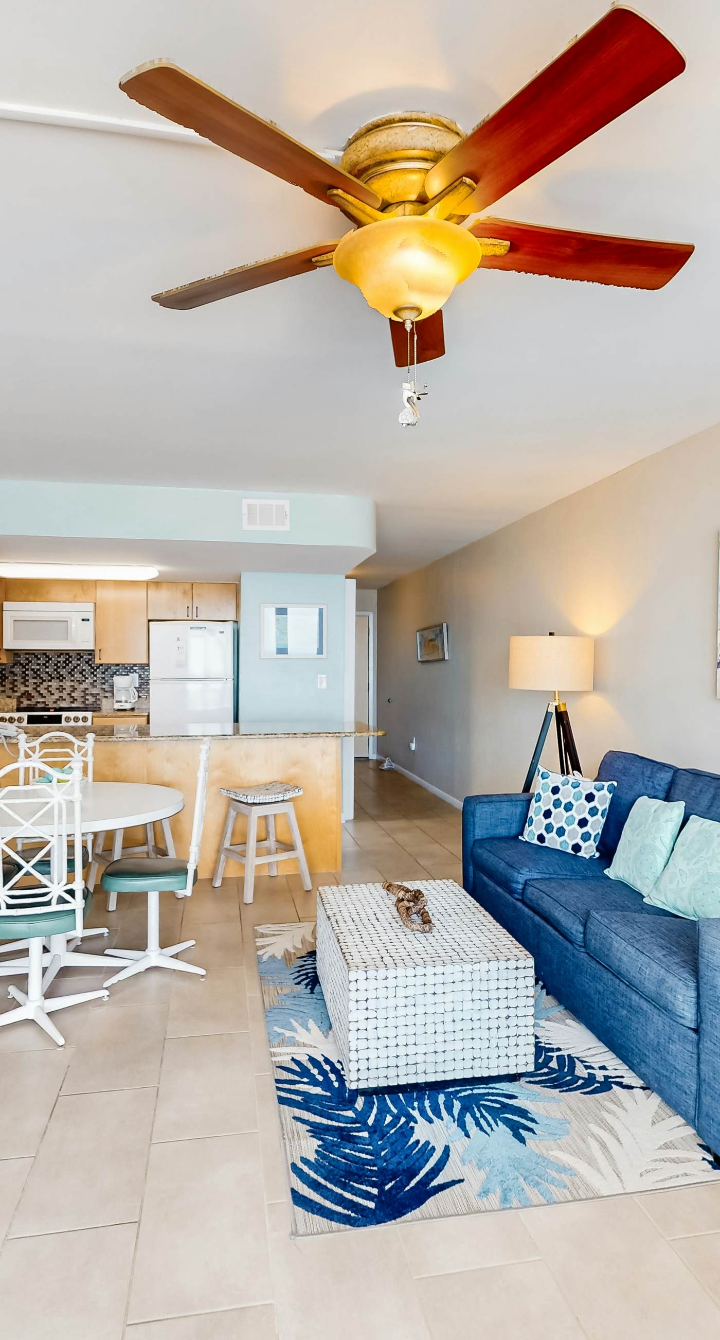 Gulf-front condo with balcony, pool, central AC, & grill