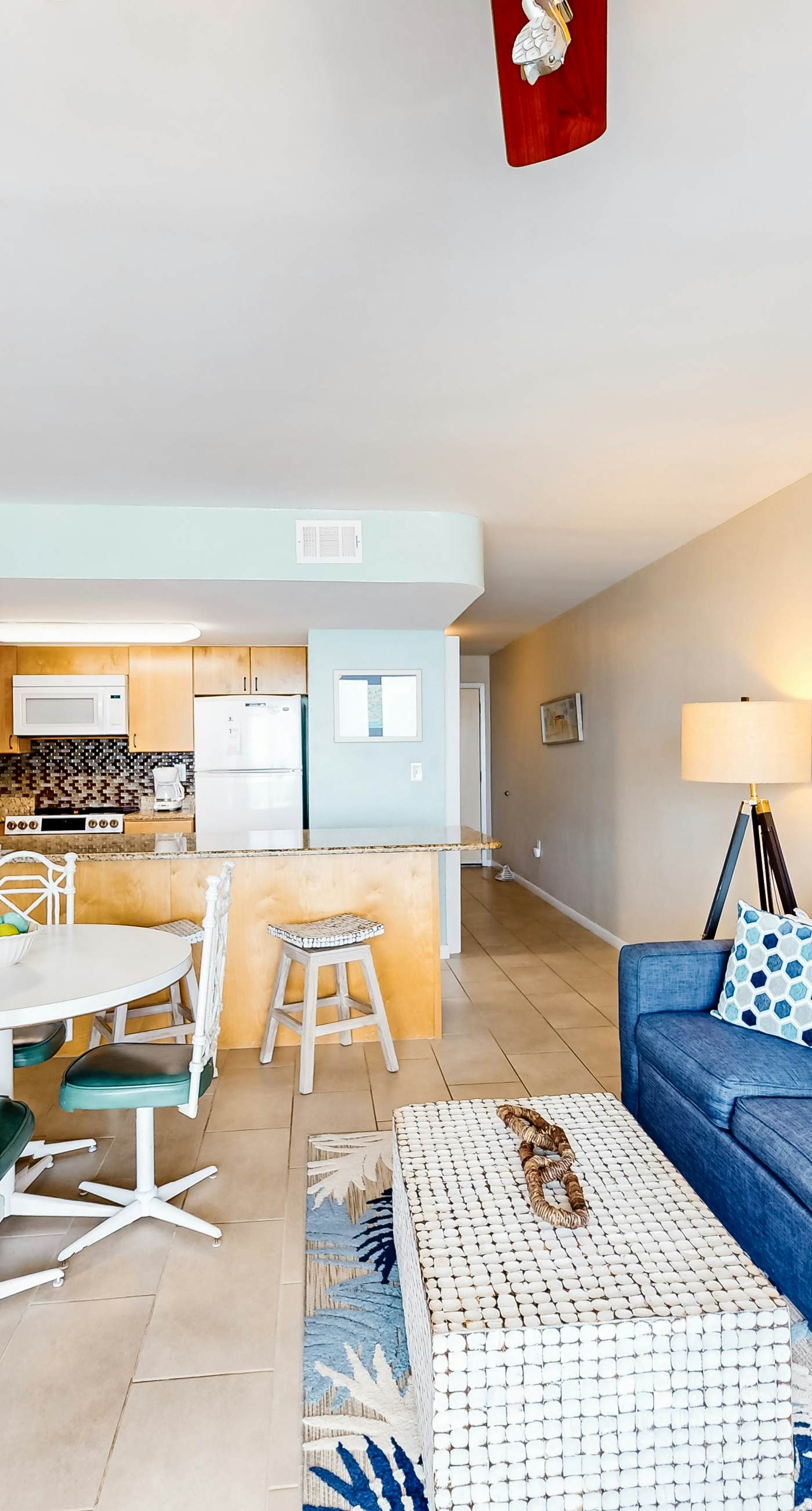 Gulf-front condo with balcony, pool, central AC, & grill