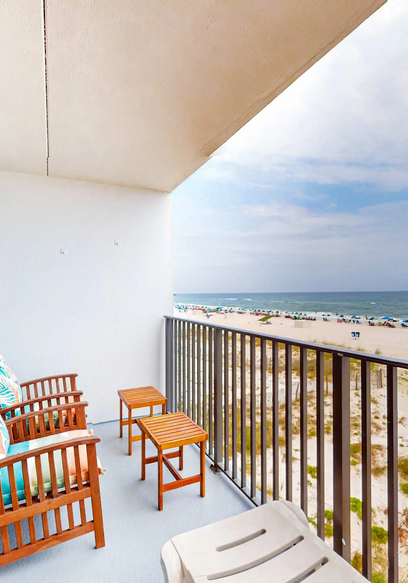 Gulf-front condo with balcony, pool, central AC, & grill