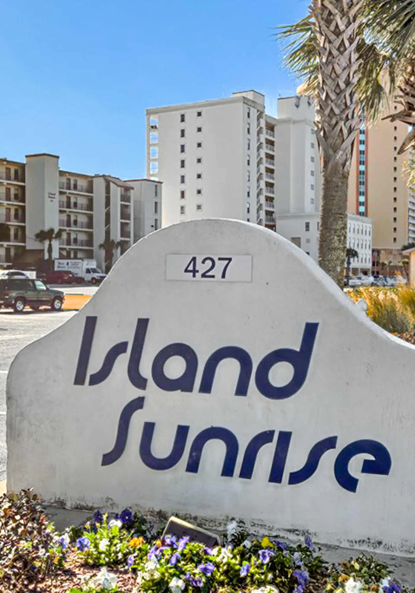 Gulf-front condo with balcony, pool, central AC, & grill