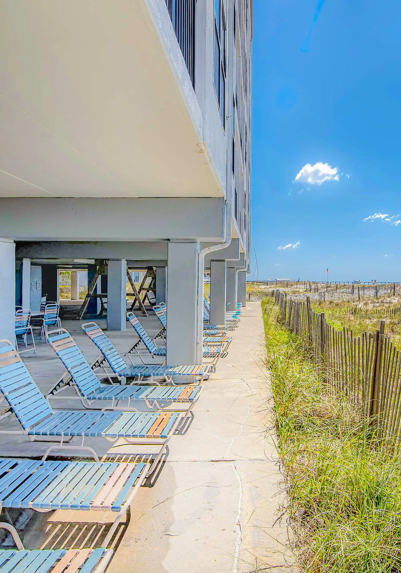 Gulf-front condo with balcony, pool, central AC, & grill