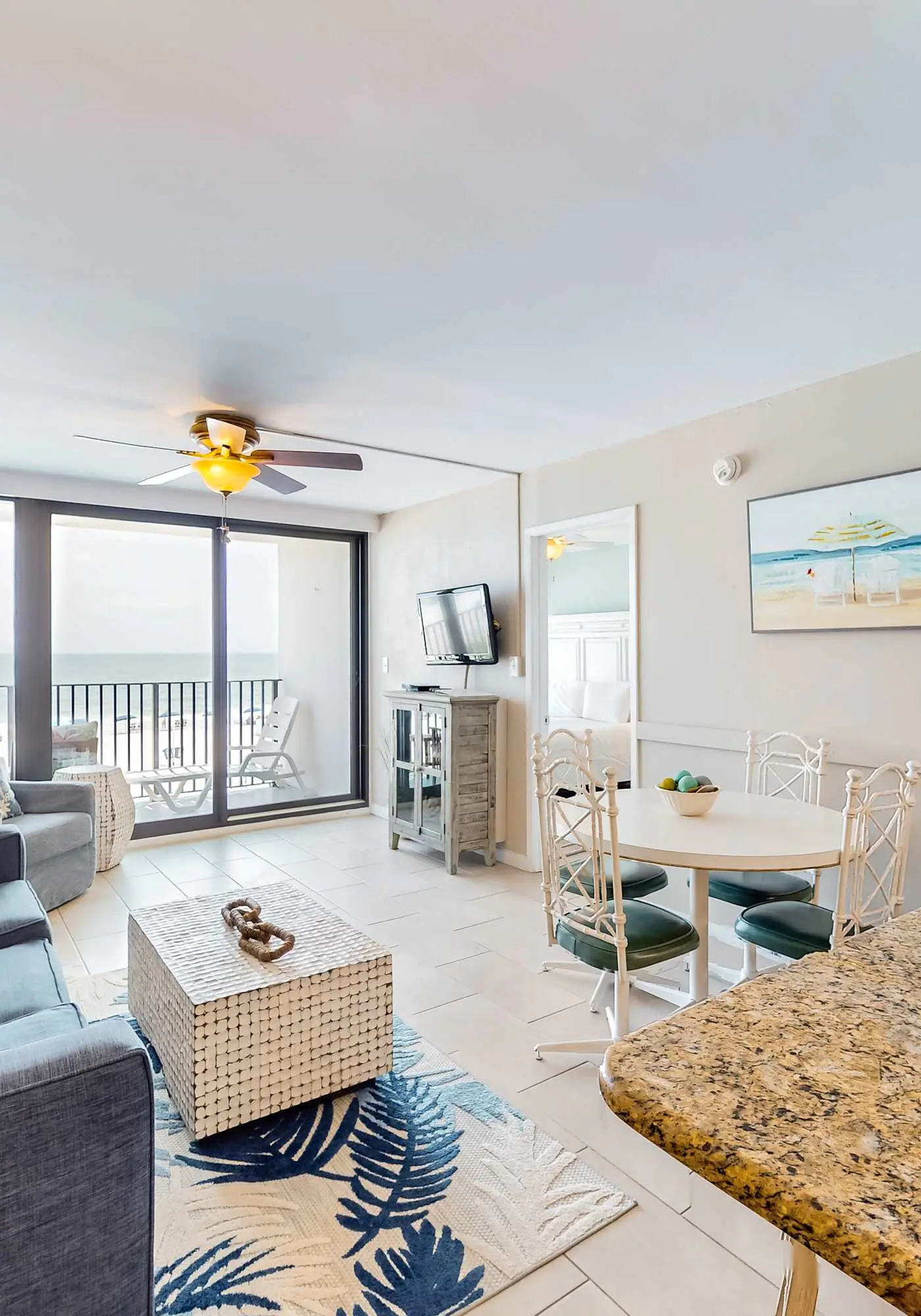 Gulf-front condo with balcony, pool, central AC, & grill