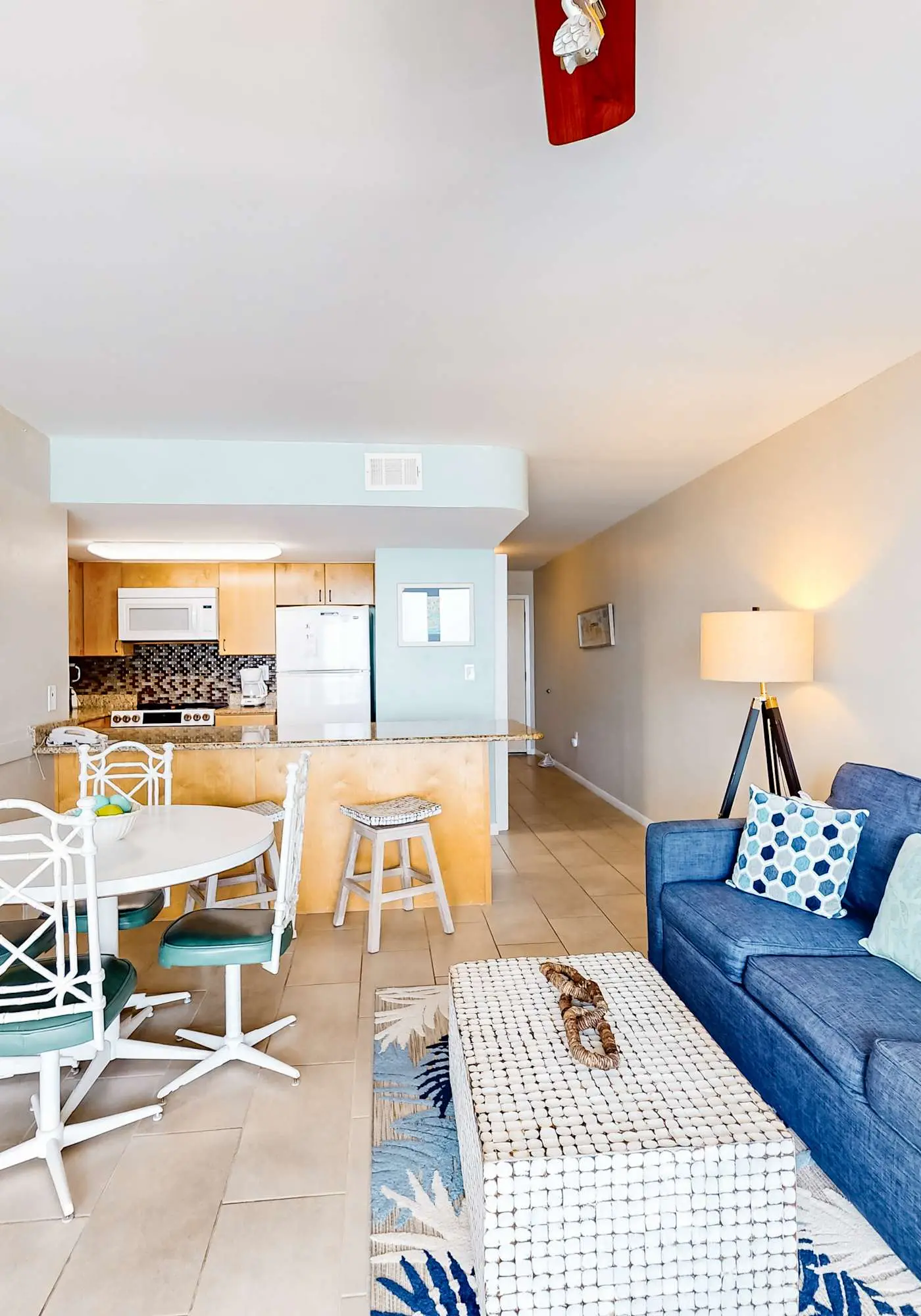 Gulf-front condo with balcony, pool, central AC, & grill