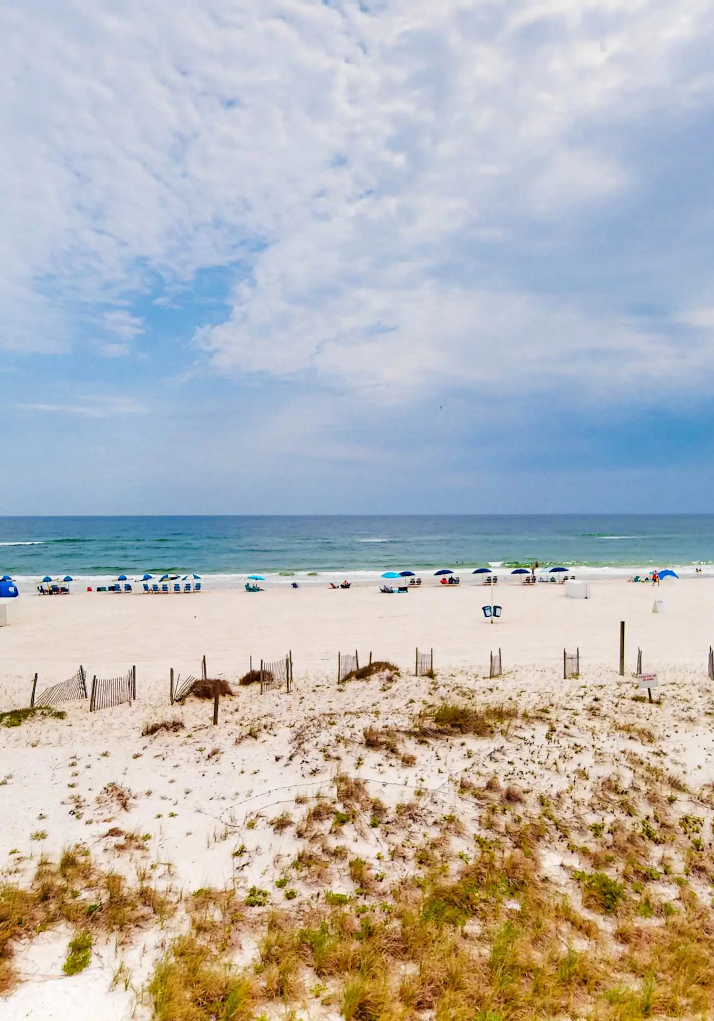 Gulf-front condo with balcony, pool, central AC, & grill