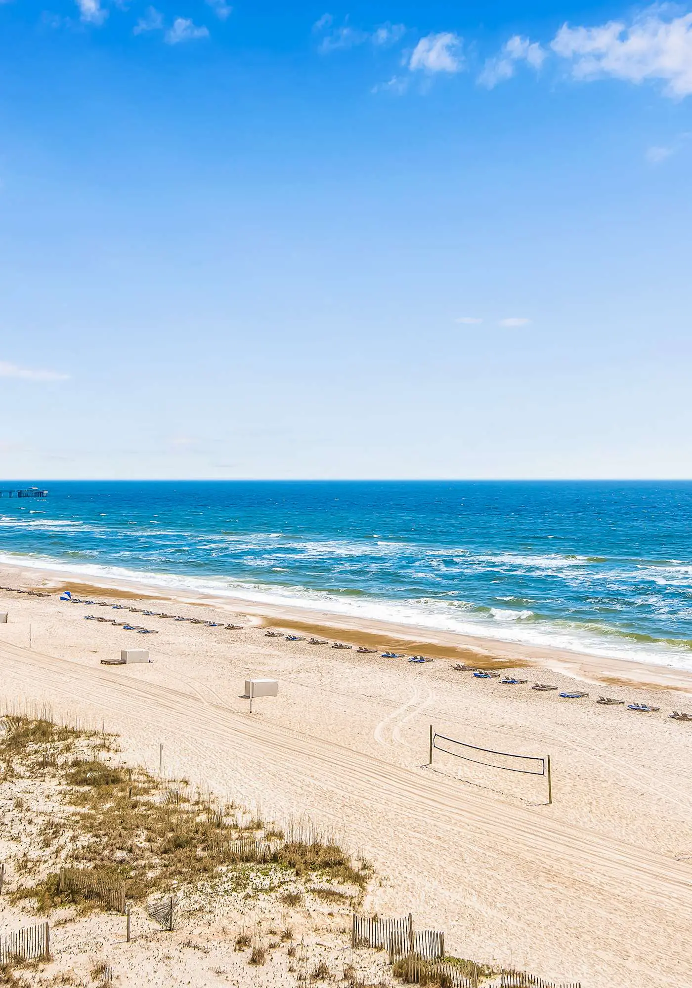 Gulf-front condo with balcony, pool, central AC, & grill