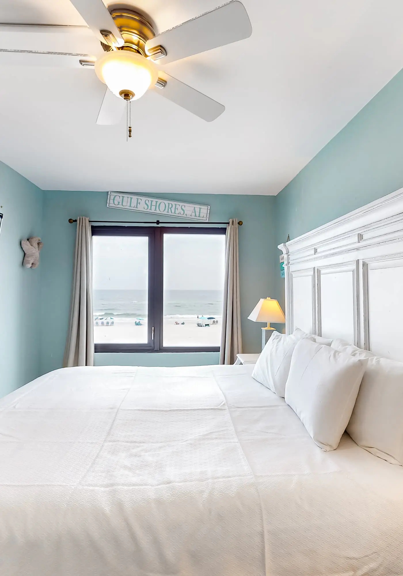 Gulf-front condo with balcony, pool, central AC, & grill