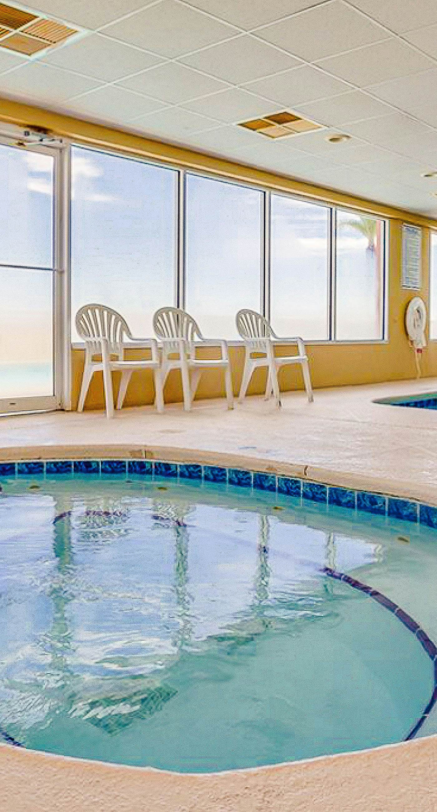 Comfortable Gulf-front condo with pool, hot tub, washer dryer, & central AC