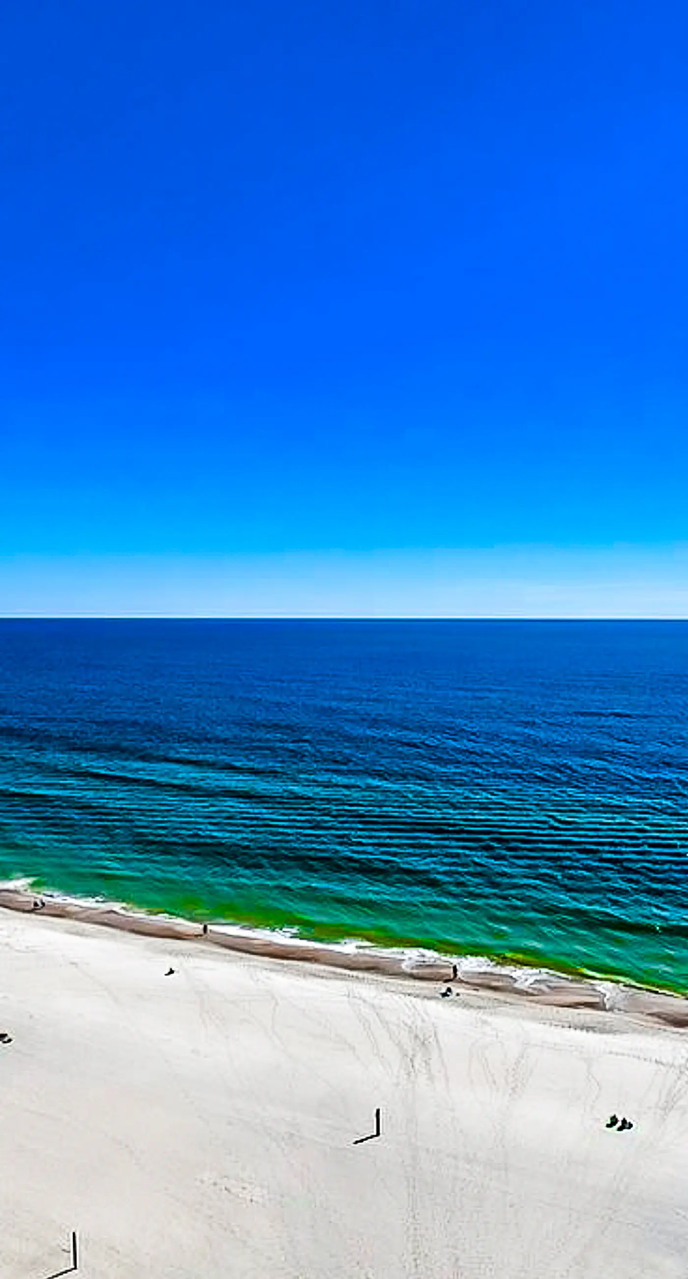 Lovely Gulf-front condo with pool, sauna, washer dryer, & central AC