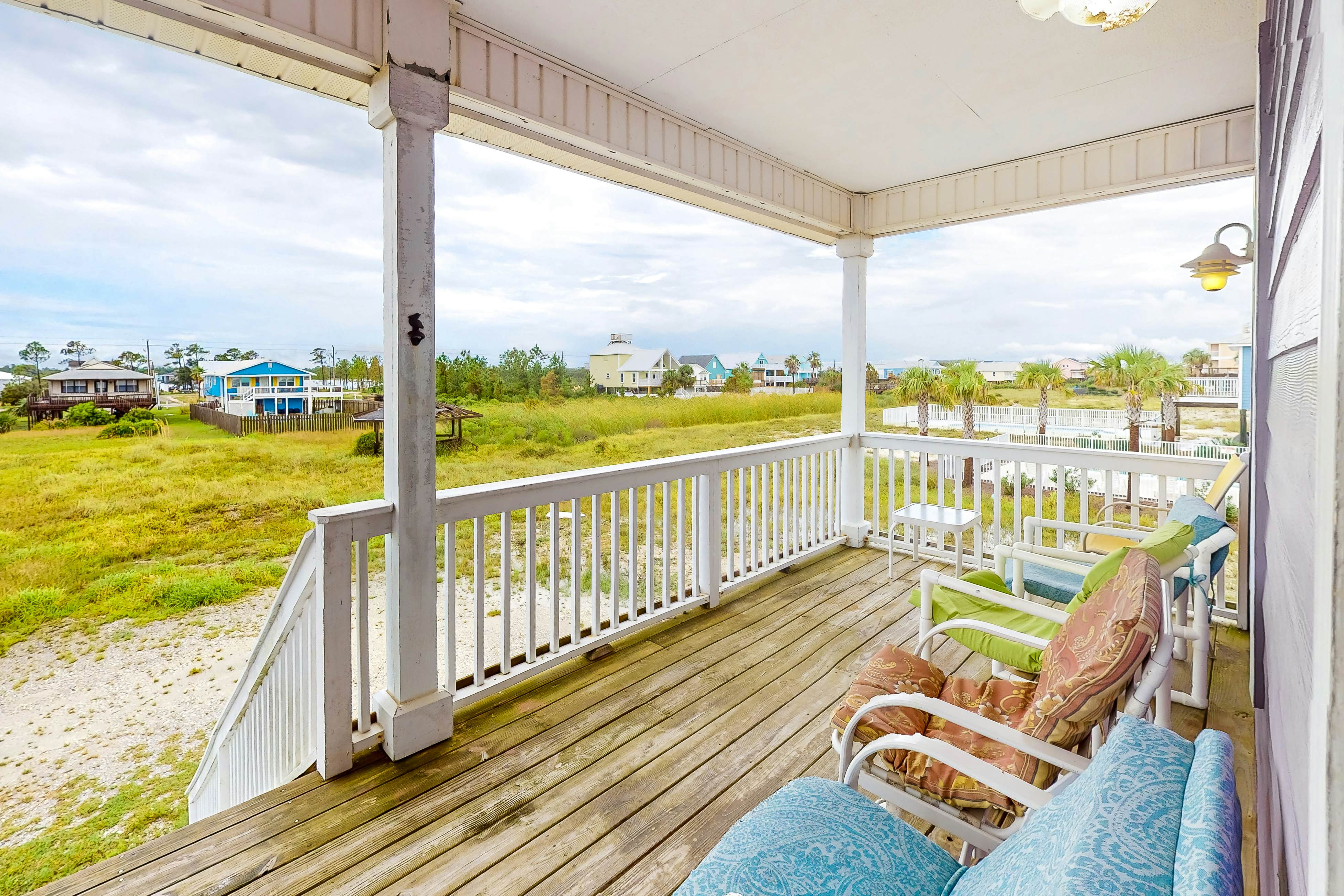 Colorful Duplex Apartment with Porch, WiFi & Central AC - Walk to the Beach