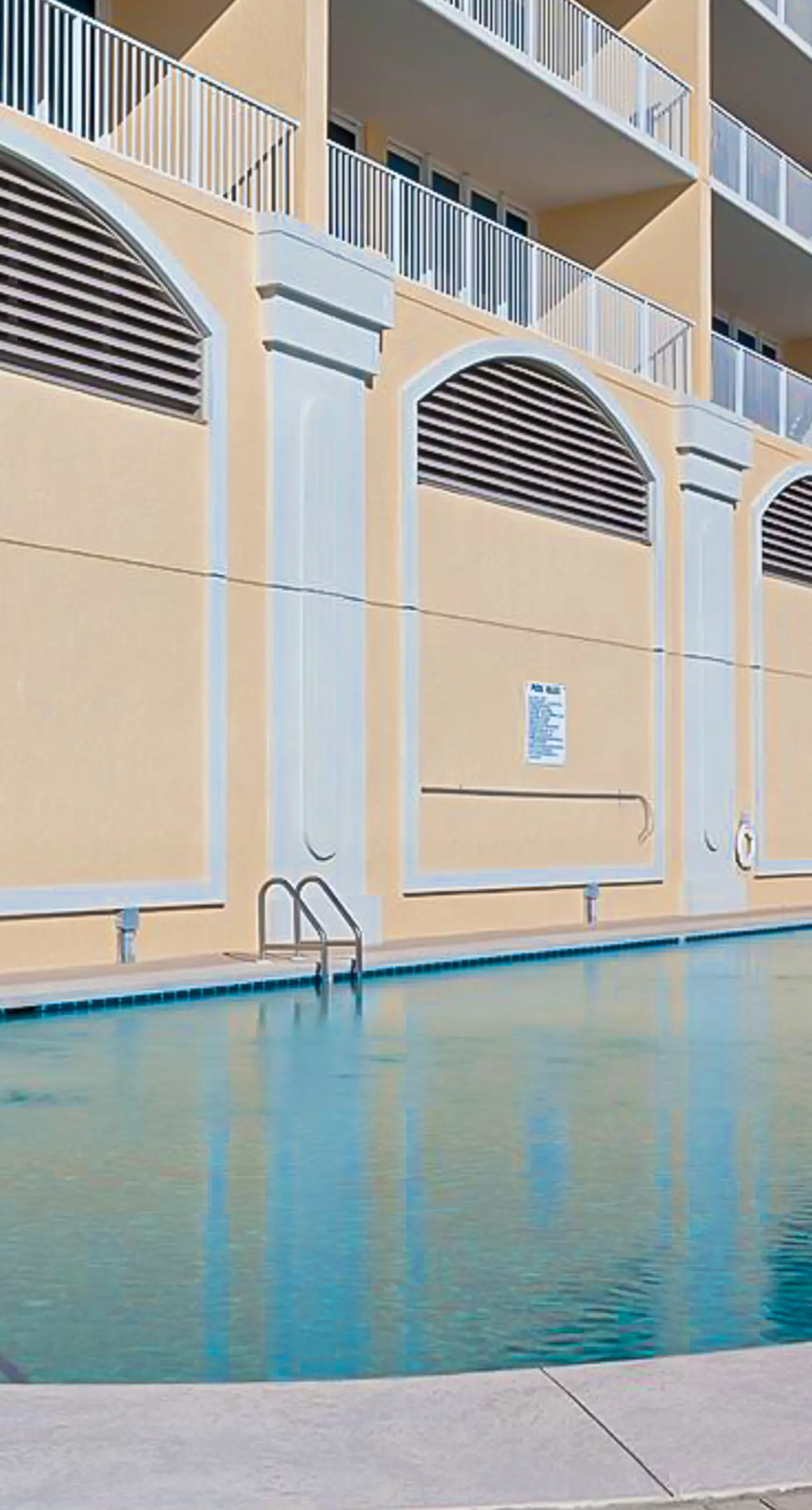 Gulf-front condo with pool, sauna, washer dryer, central AC, & gym