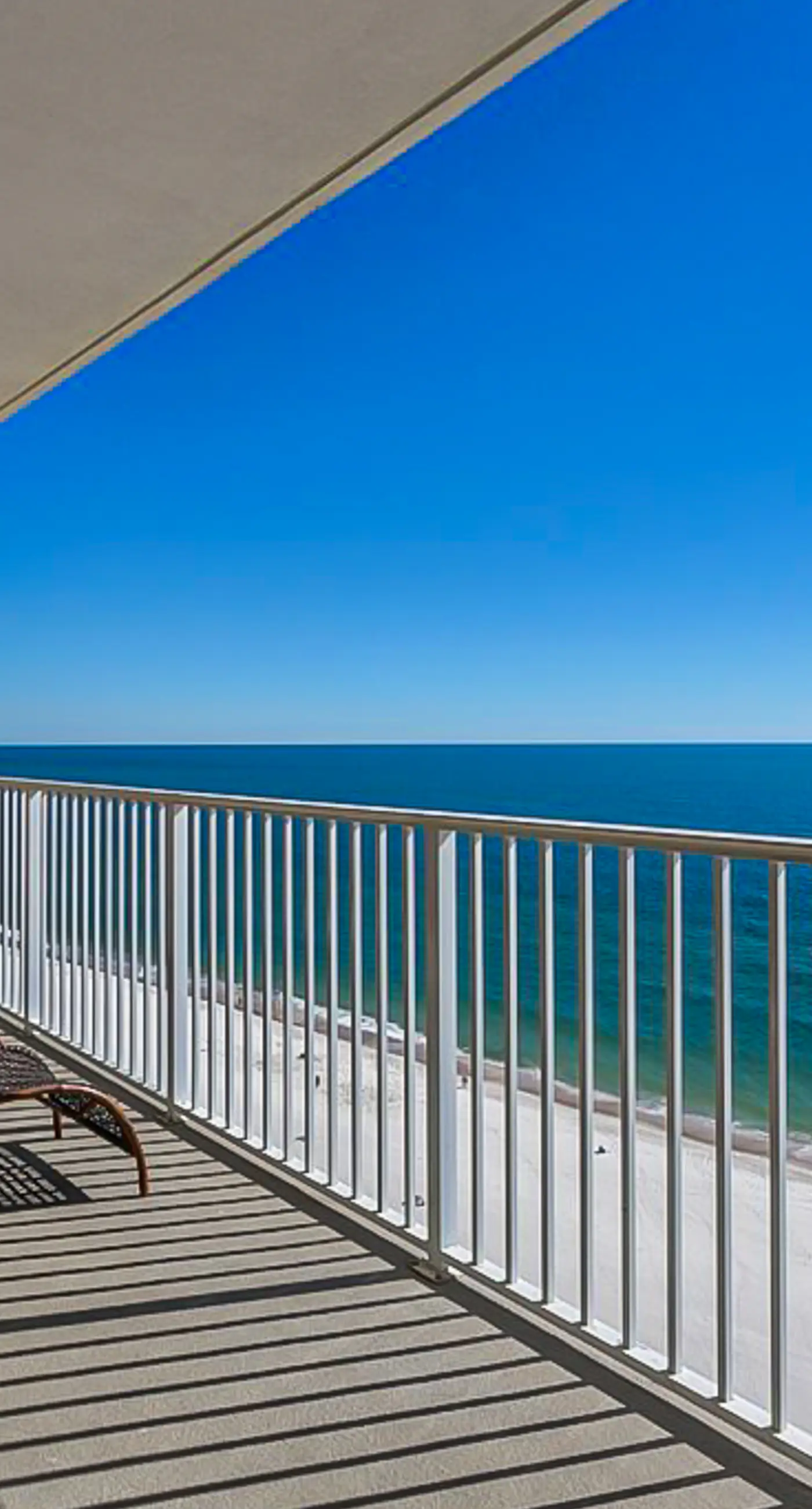 Gulf-front condo with pool, sauna, washer dryer, central AC, & gym