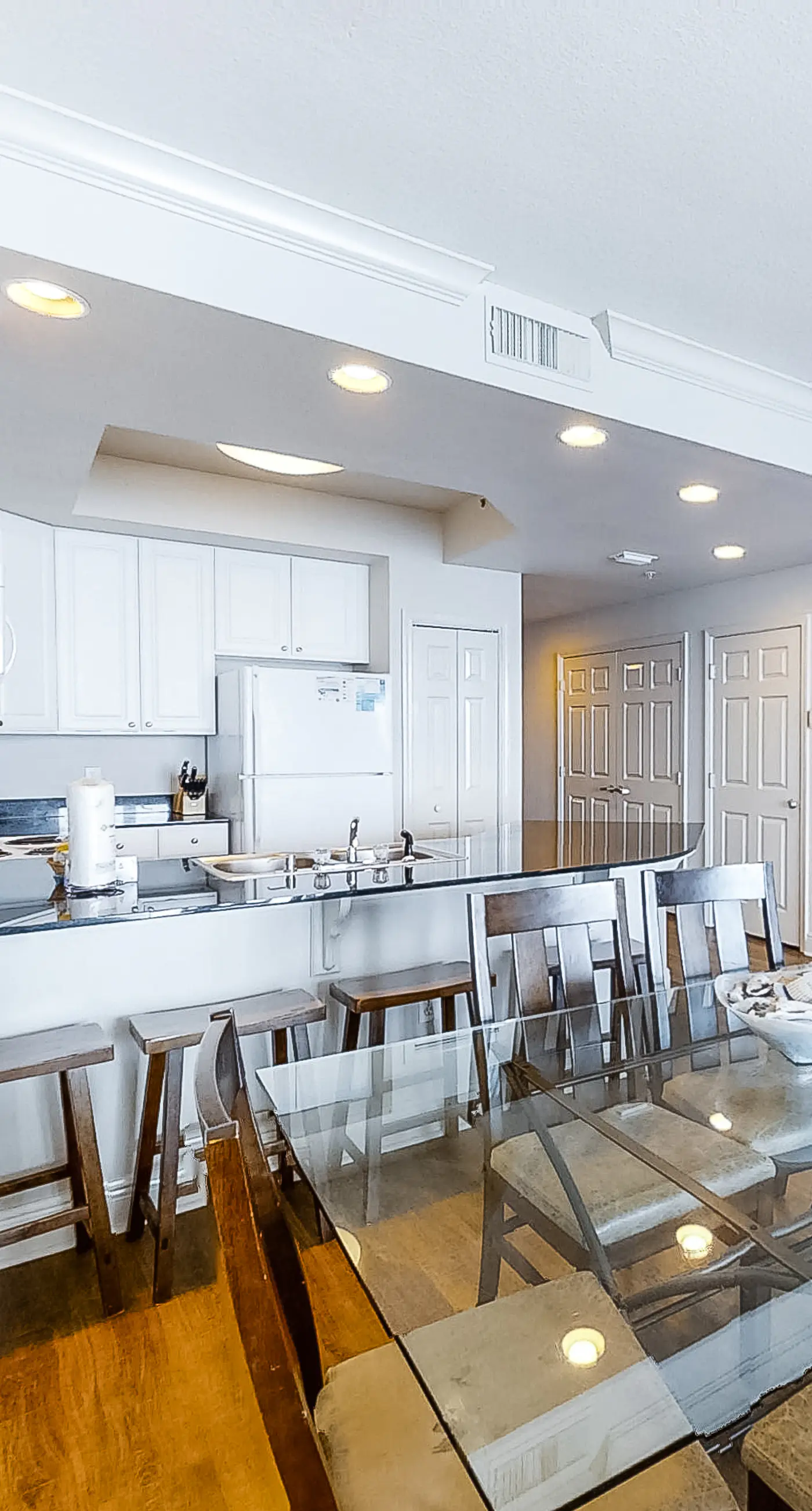 Gulf-front condo with pool, sauna, washer dryer, central AC, & gym