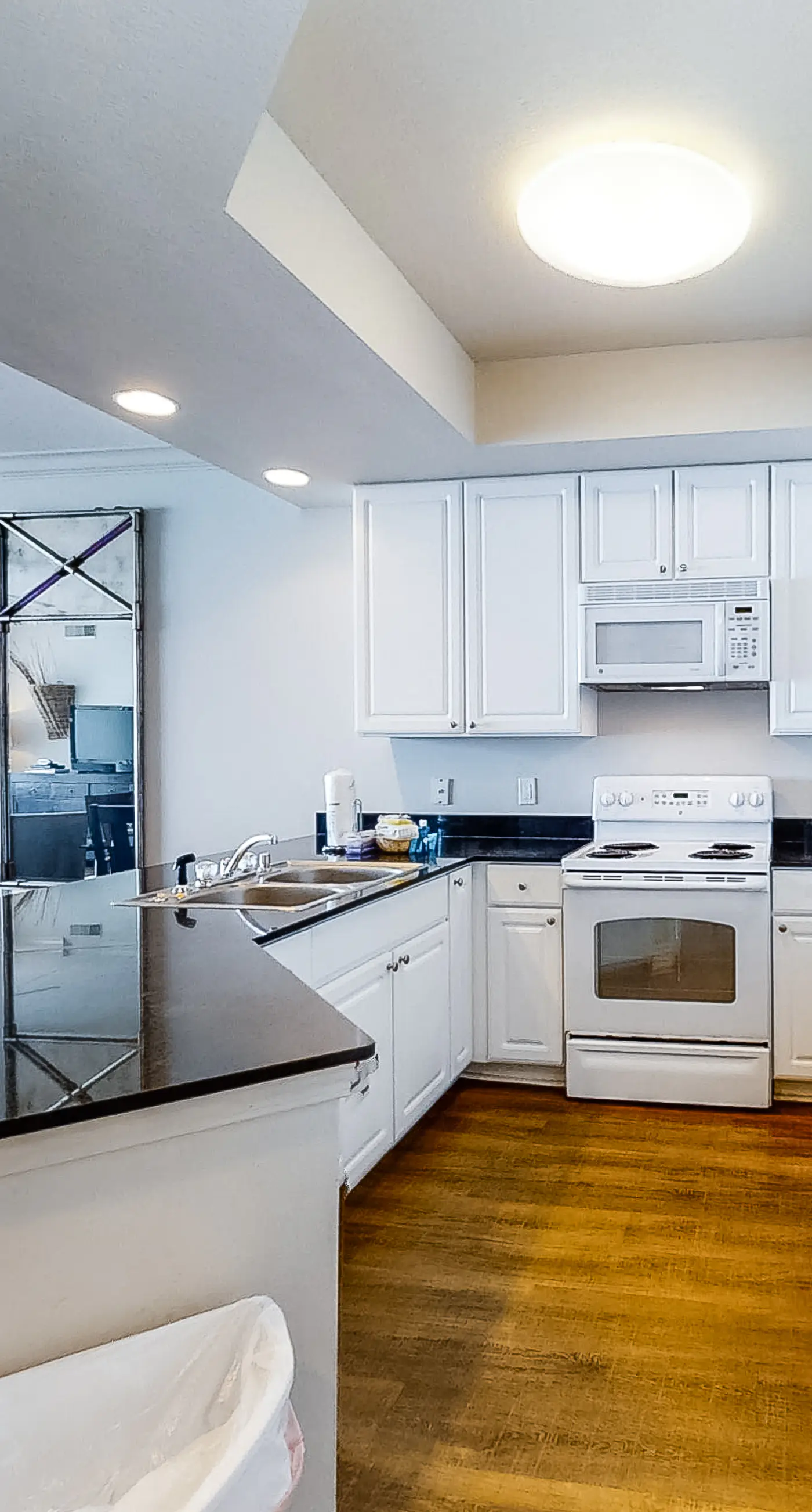 Gulf-front condo with pool, sauna, washer dryer, central AC, & gym