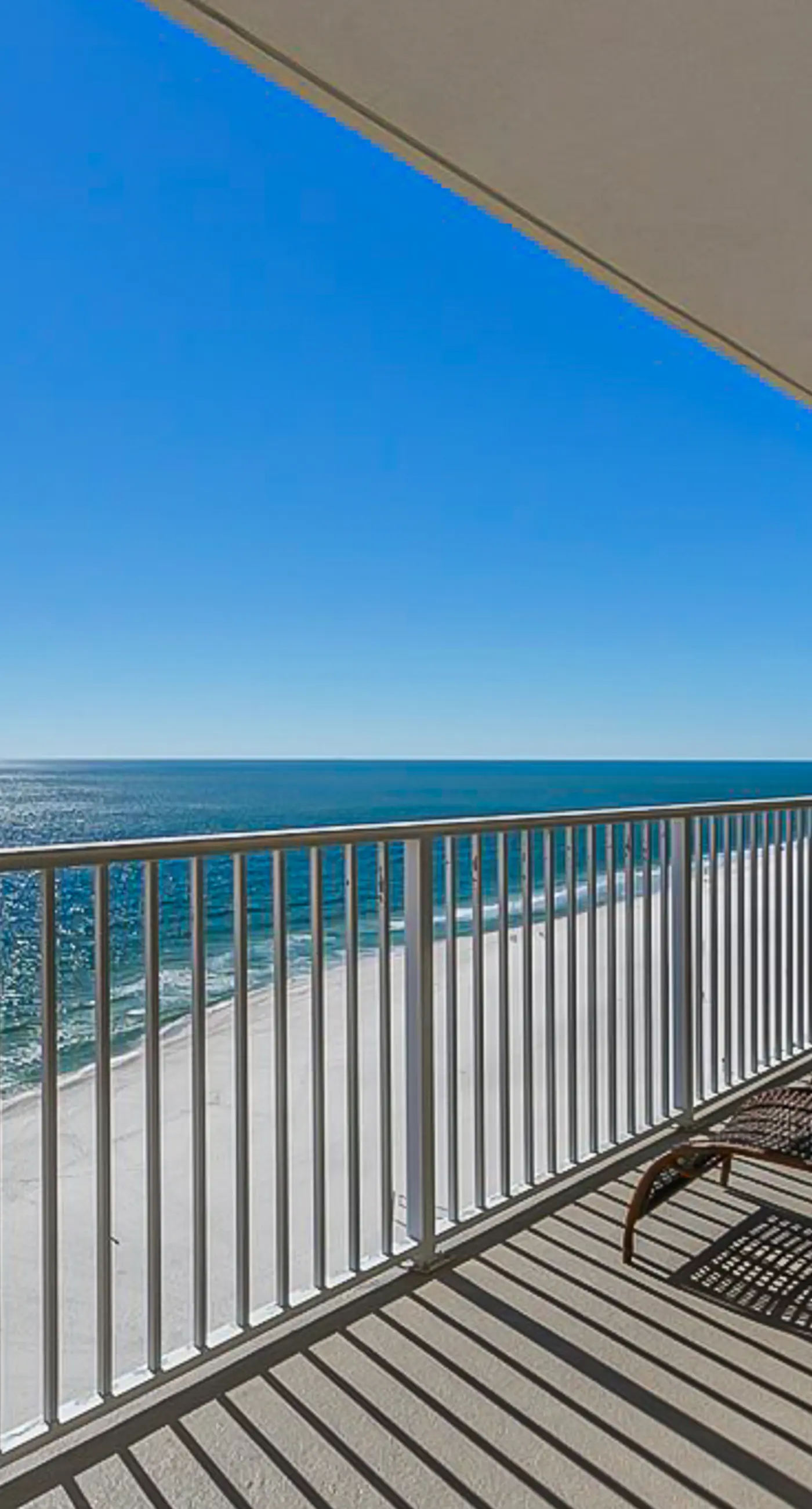 Gulf-front condo with pool, sauna, washer dryer, central AC, & gym