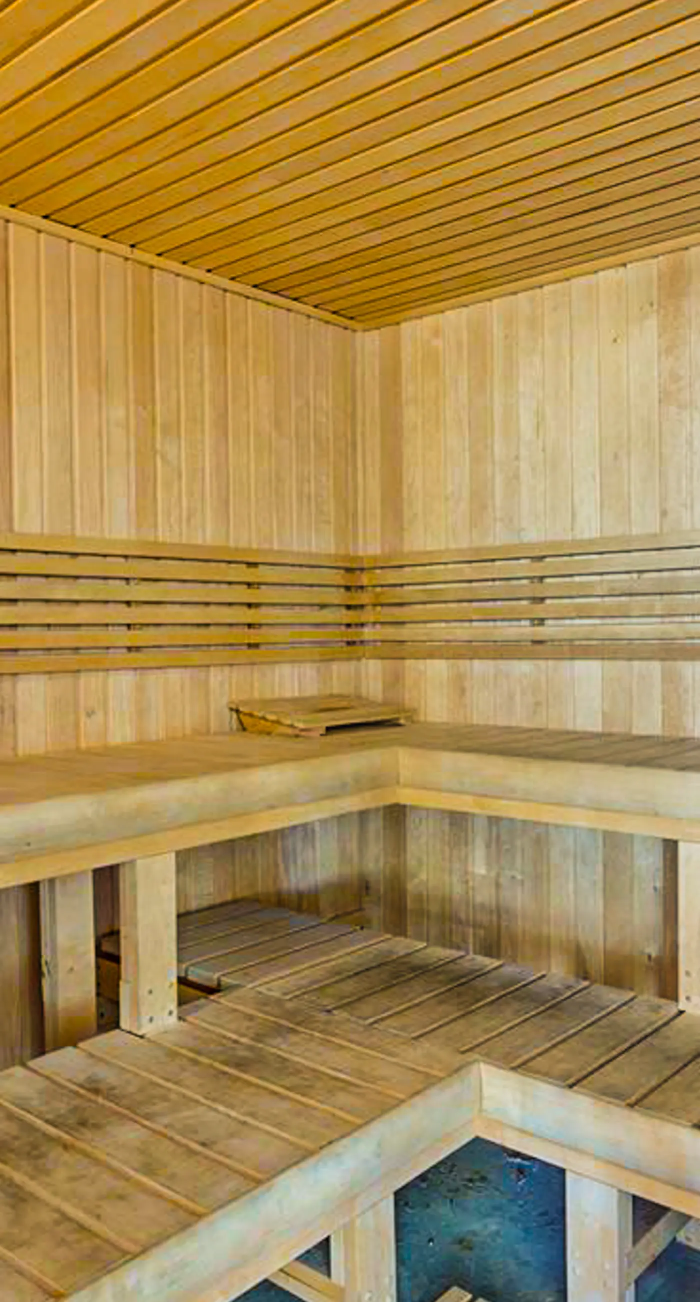 Gulf-front condo with pool, sauna, washer dryer, central AC, & gym