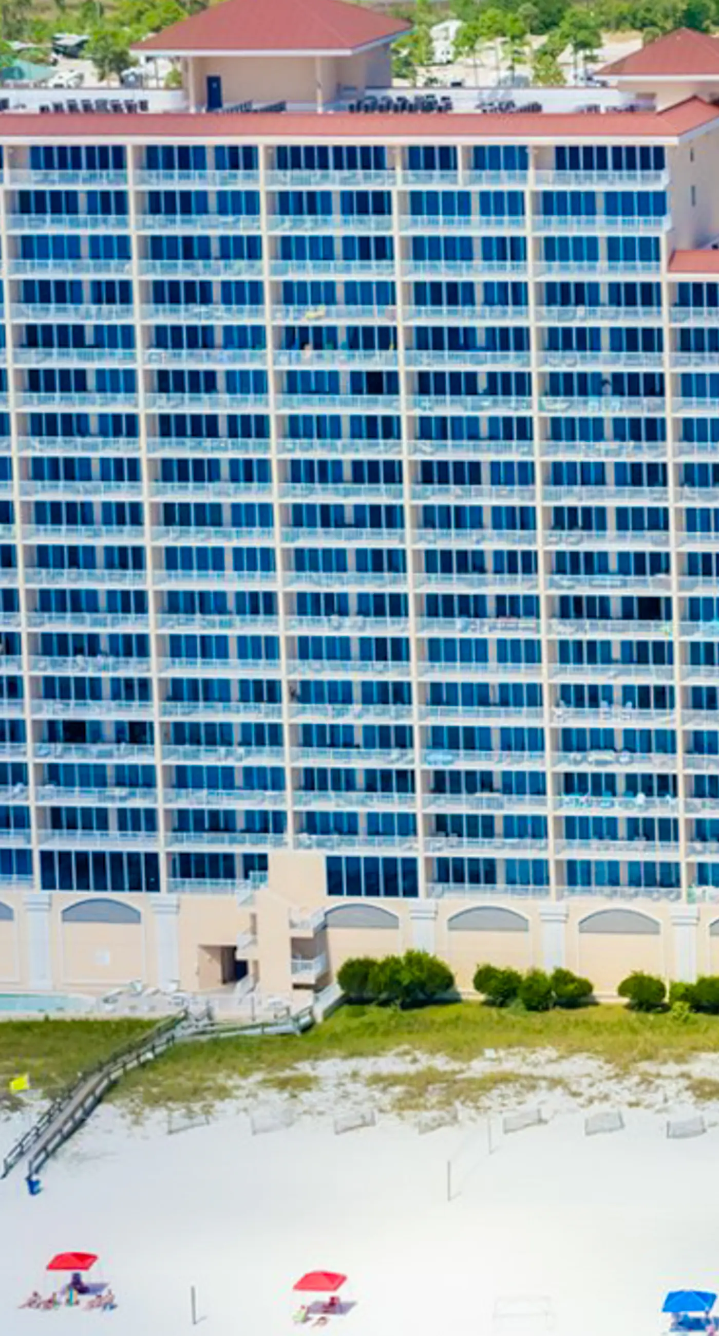 Gulf-front condo with pool, sauna, washer dryer, central AC, & gym