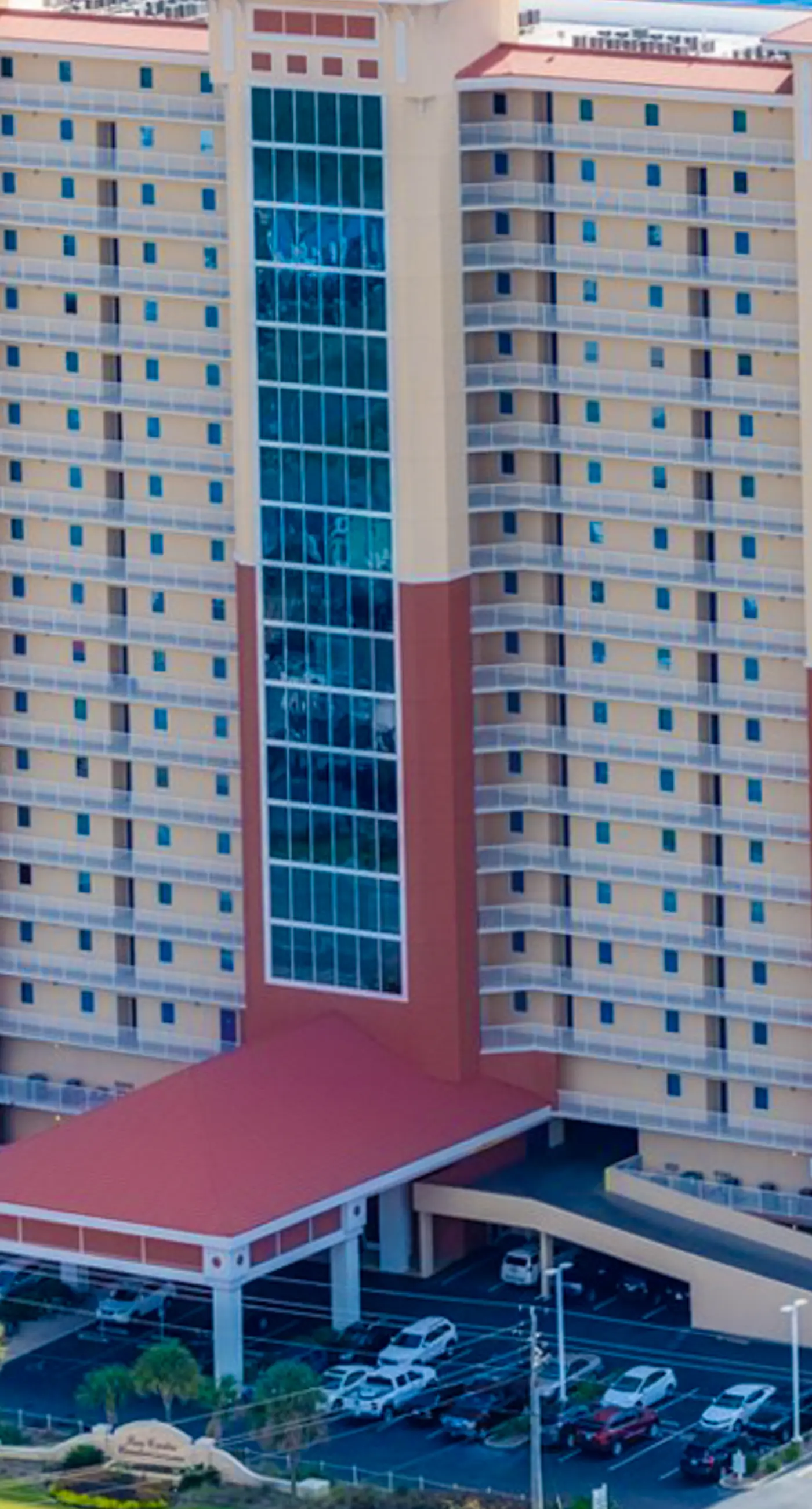 Gulf-front condo with pool, sauna, washer dryer, central AC, & gym